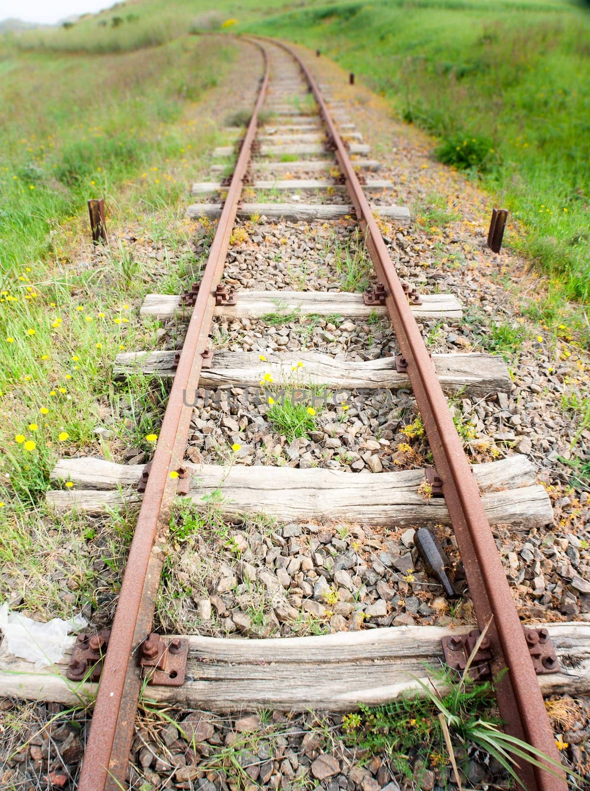 Old Wood Tie iron. Old railroad in the country