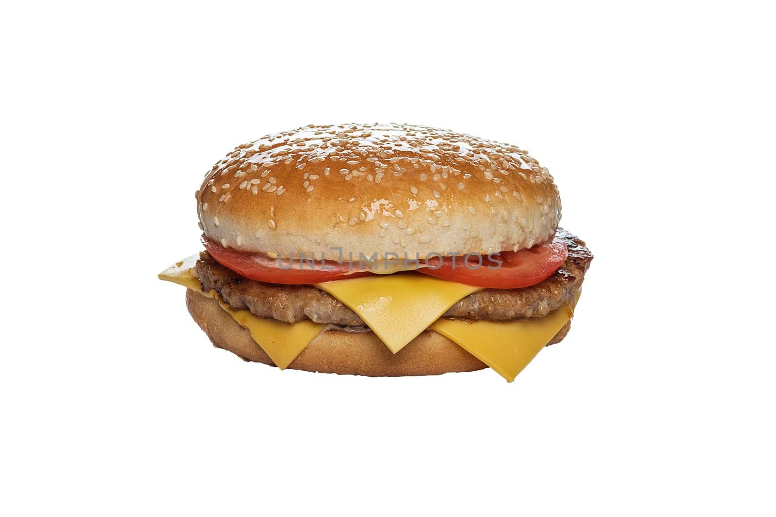 Bun with sesame with cutlet, cheese, bacon and cucumber inside isolated on white background