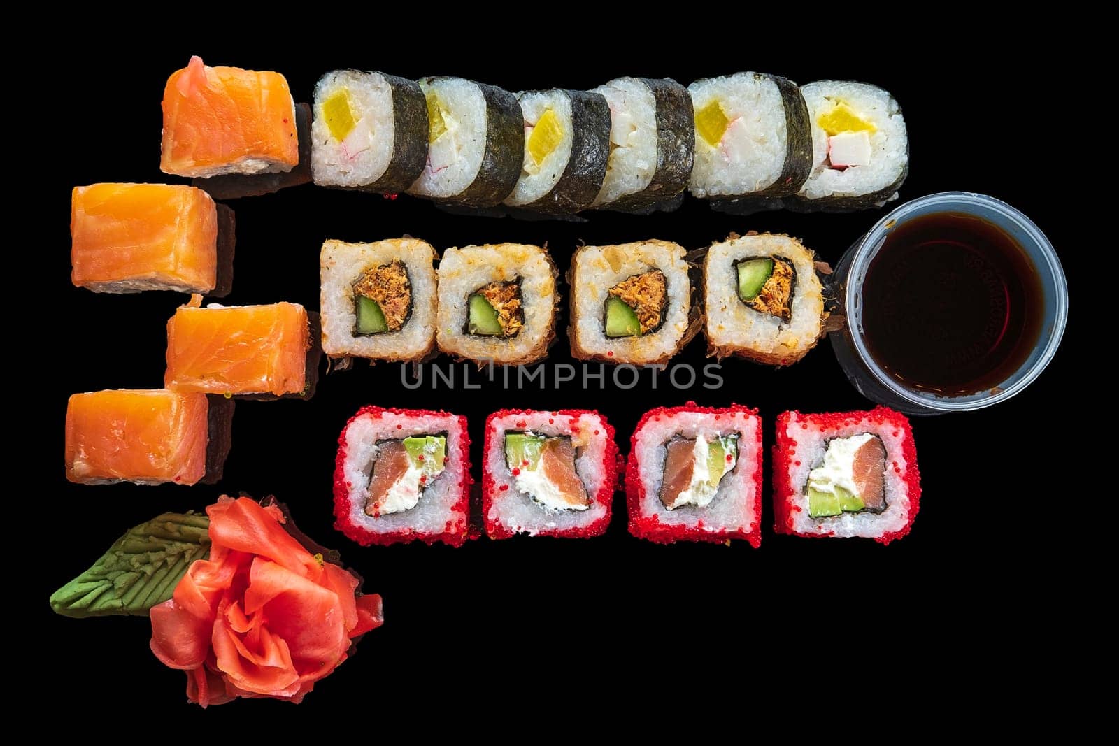 Top view of big set of rolls on black background