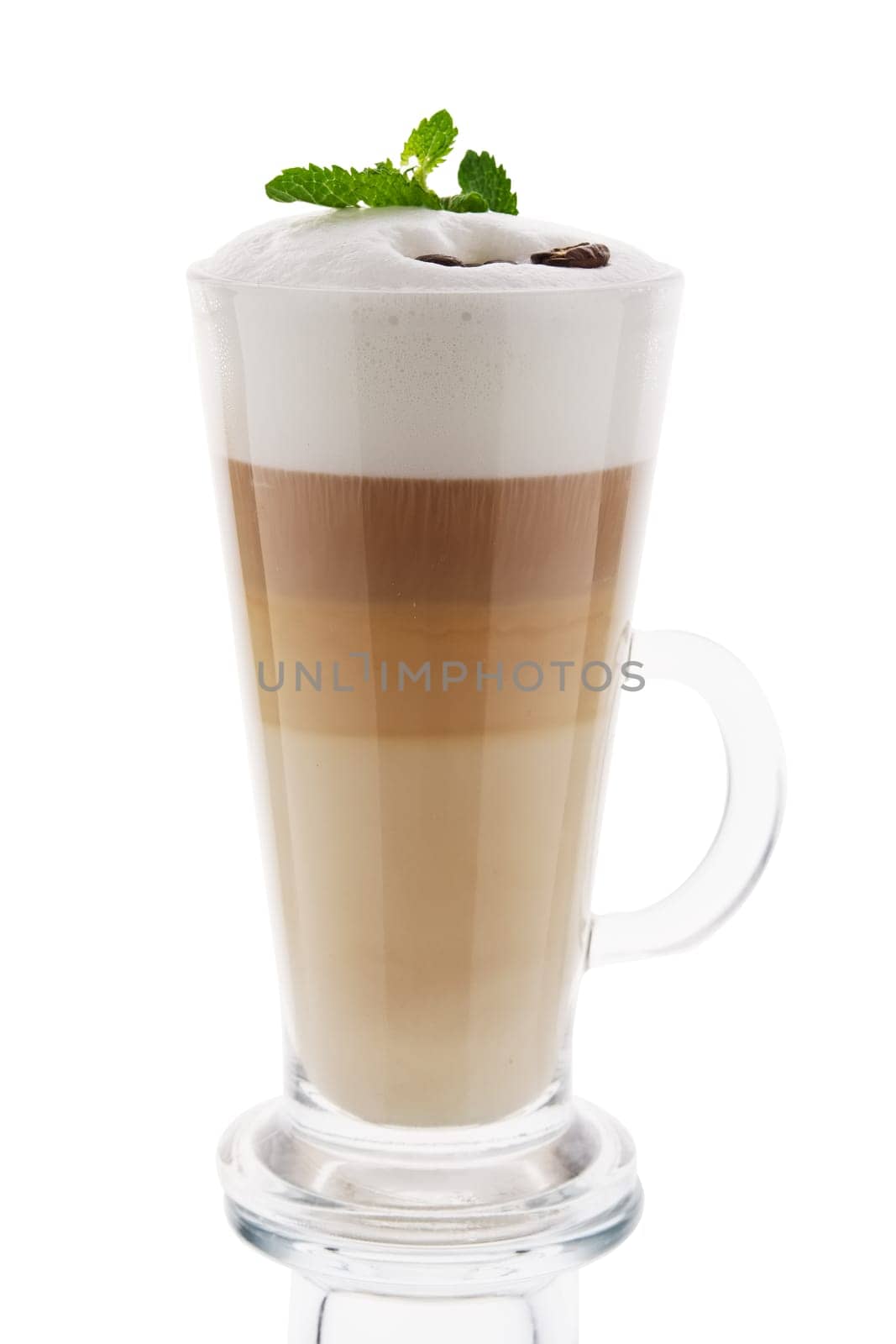 Cappuccino in tall glass isolated on white background