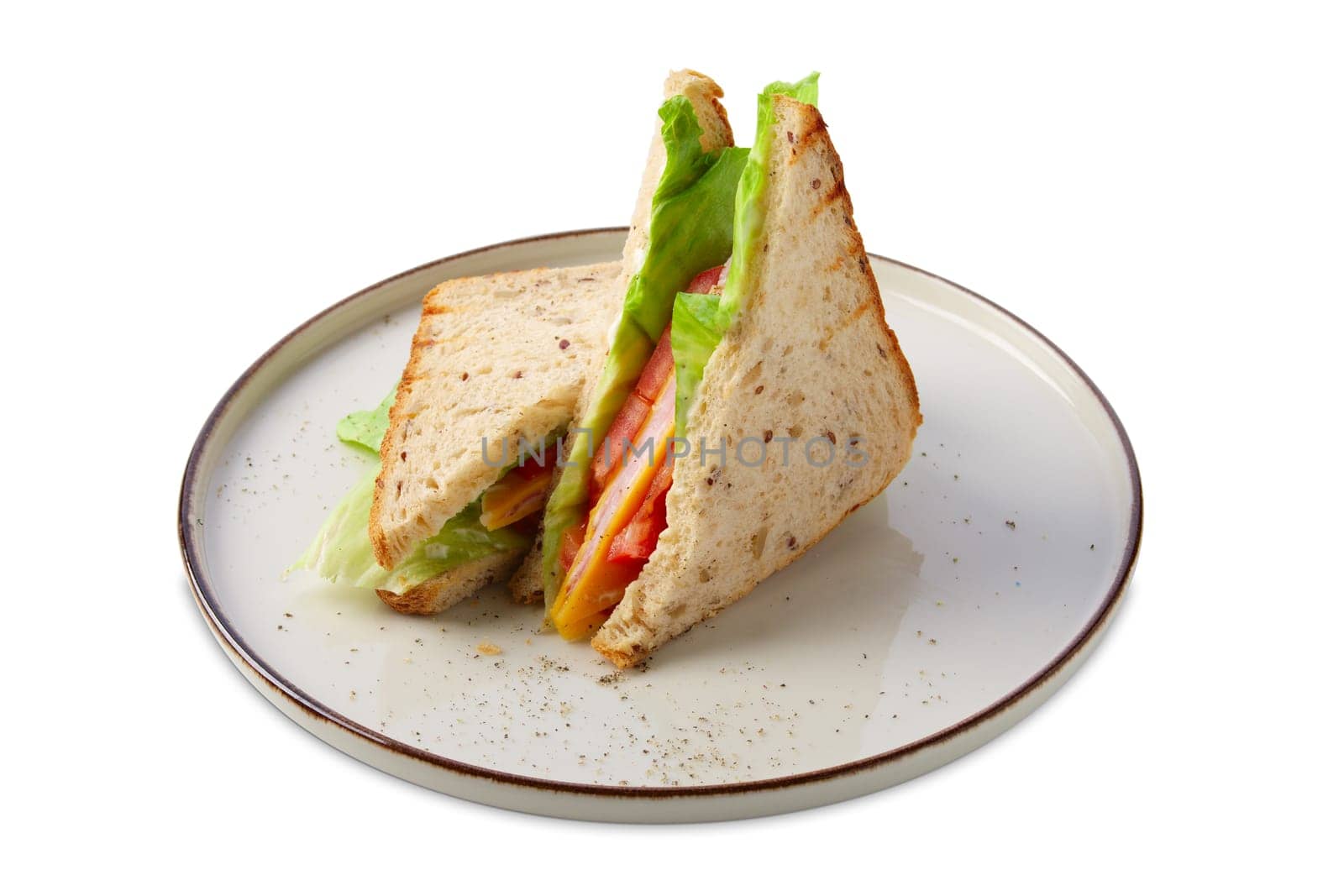 Club sandwich with ham, cucumber, salad and cheese isolated on white