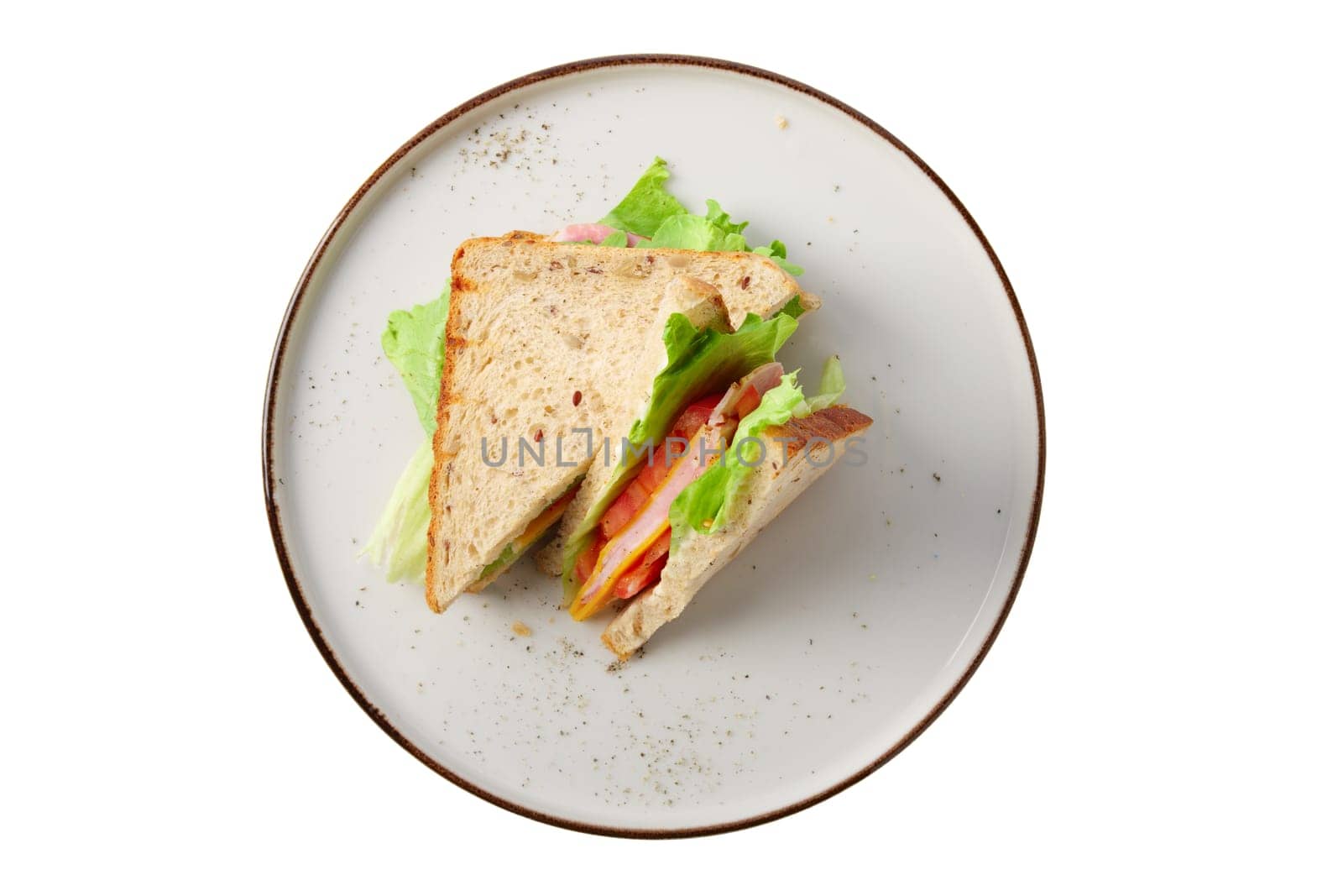 Club sandwich with ham, cucumber, salad and cheese isolated on white