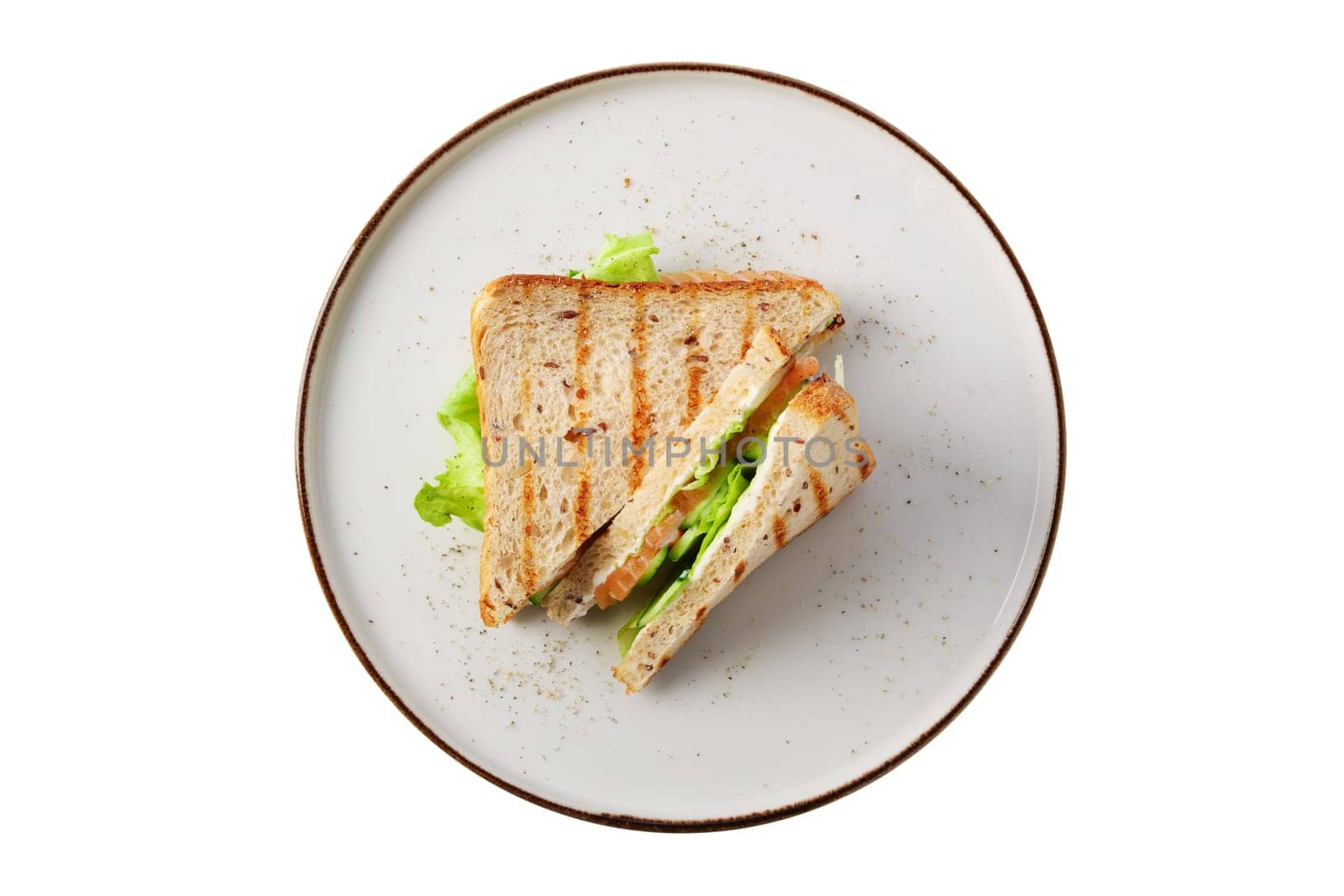 Club sandwich with salmon, cucumber, salad and cheese isolated on white