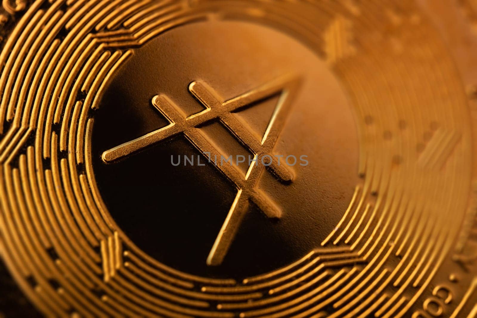 top view extreme macro closeup of crypto cardano golden coin logo symbol