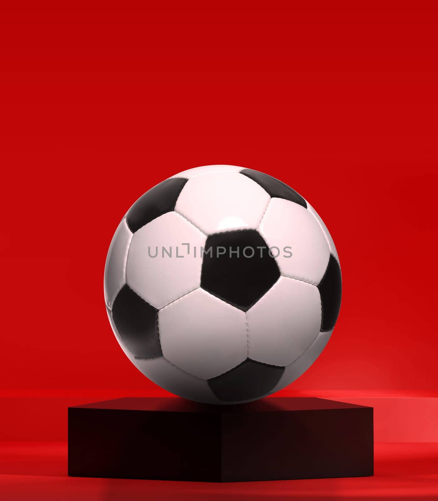 Soccer ball on black pentagon podium in the red studio