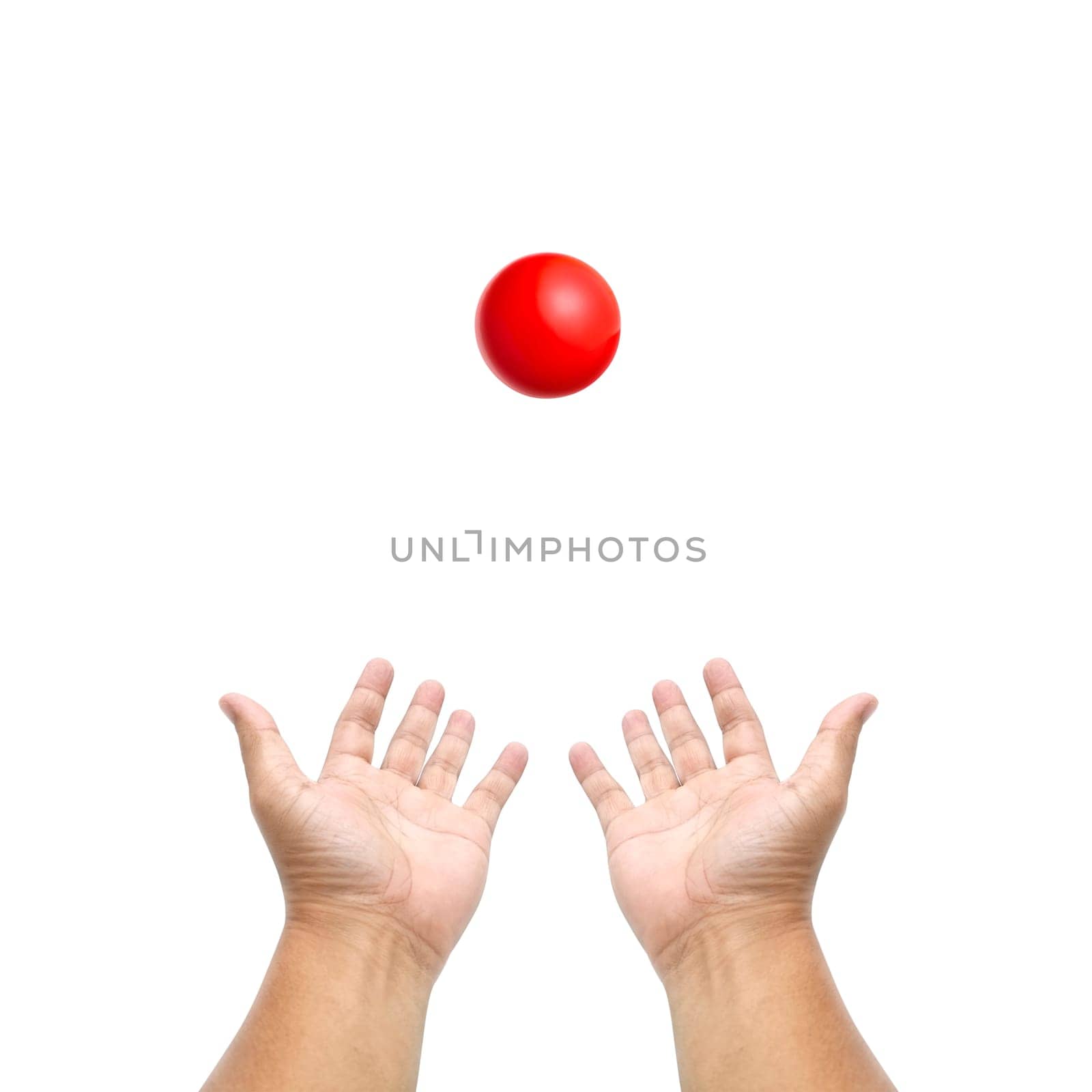 Hand holding snooker ball on white background