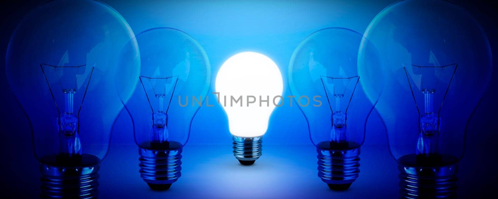 light bulb on blue background idea concept