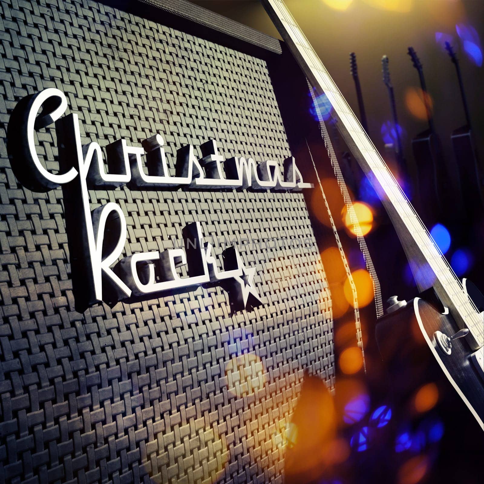 Guitar amplifier with a chrome badge Christmas Rock and blurred Christmas lights, 3d rendering