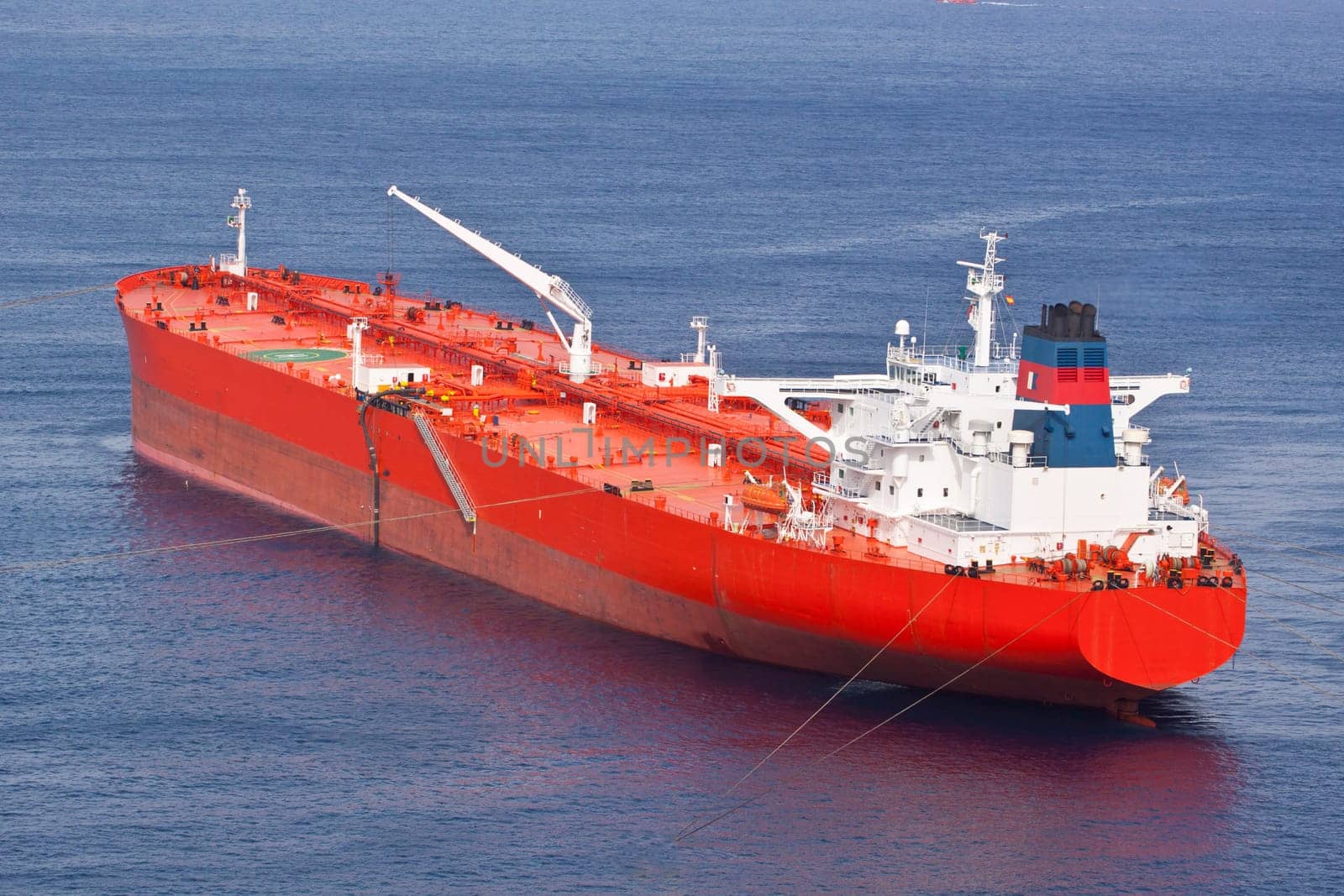 Red oil tanker. Transportation by water.