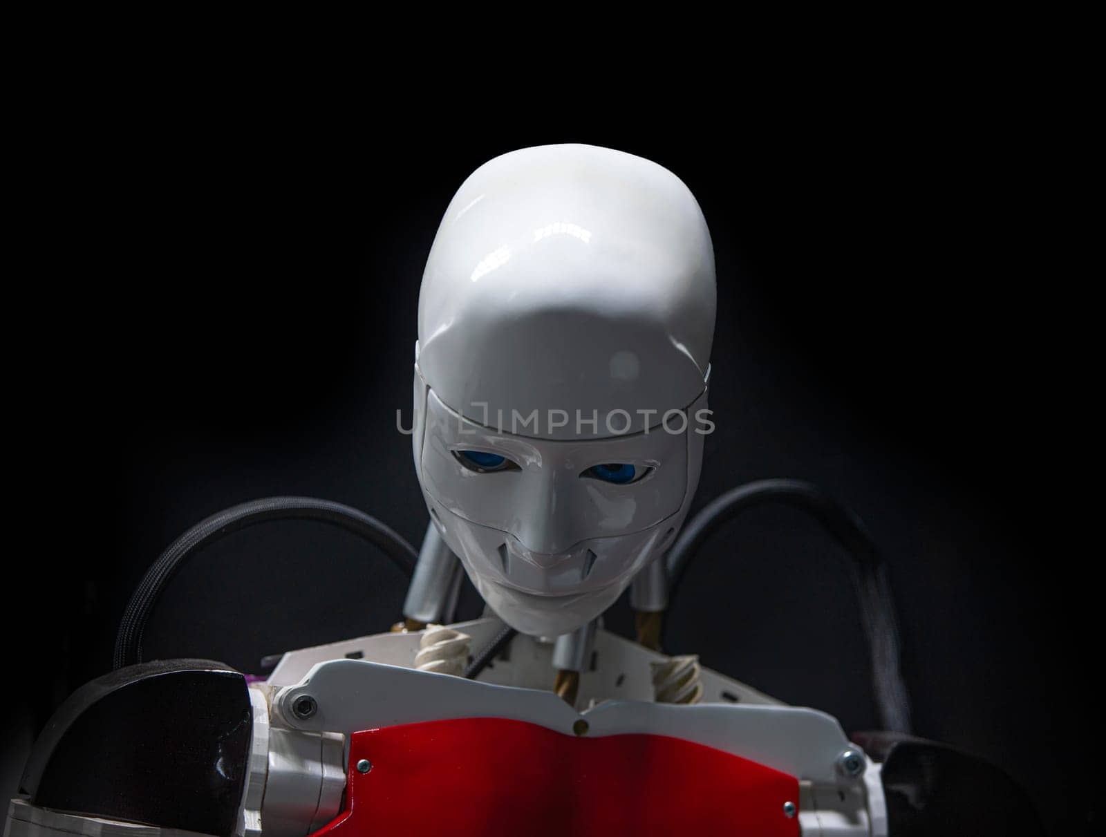 The ANDROID ROBOT made of modern materials on a black background