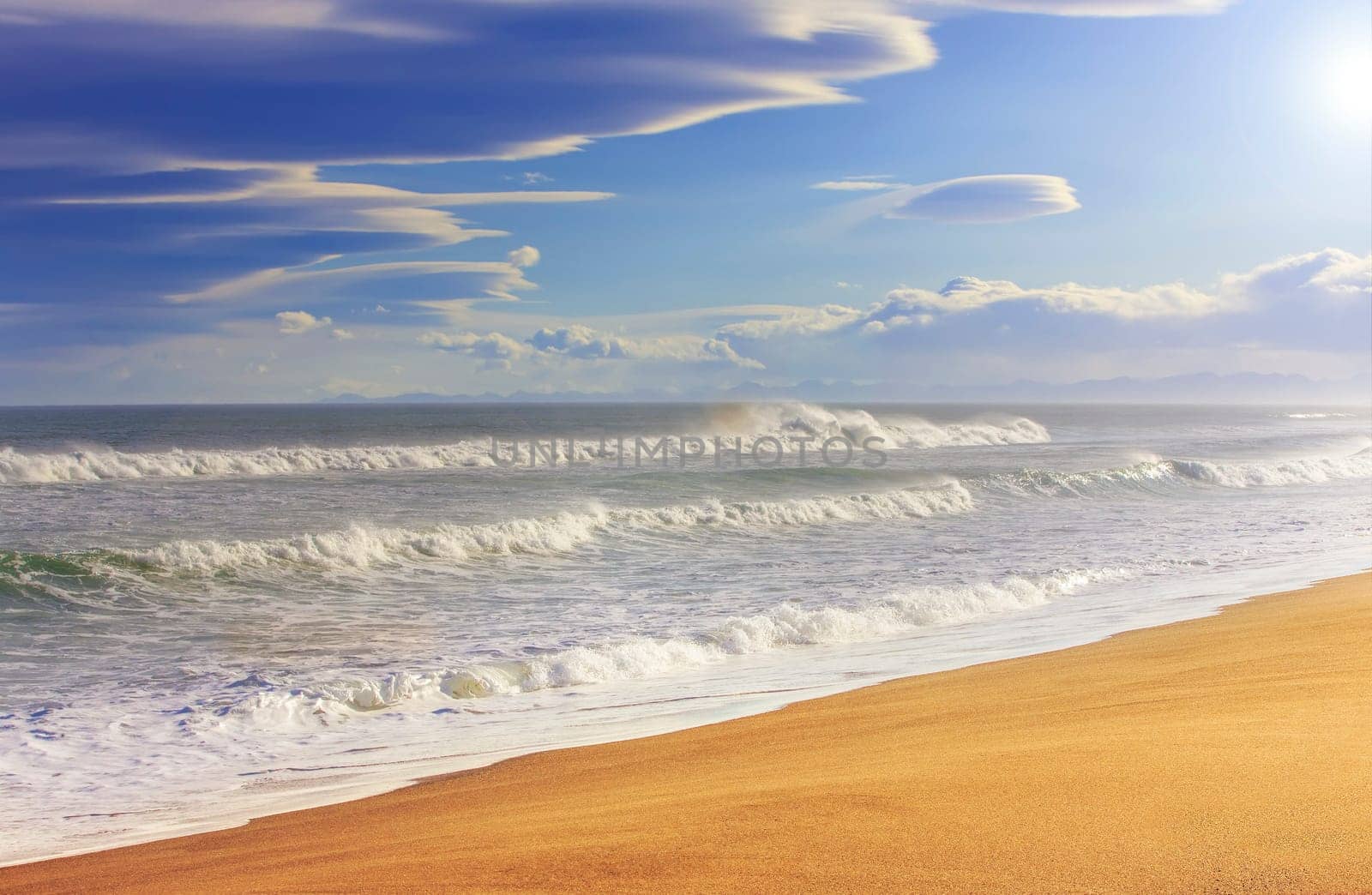 The Beautiful yellow sand beach. Blue ocean and yellow sand