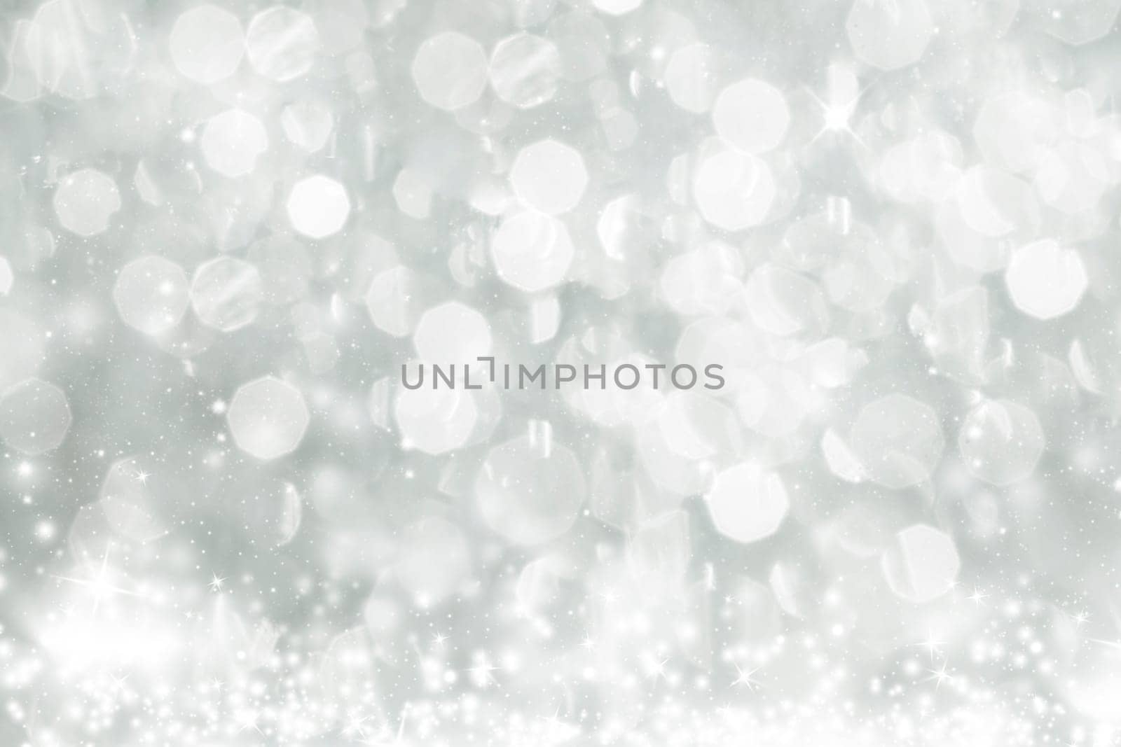 Light silver abstract Christmas background with white snowflakes