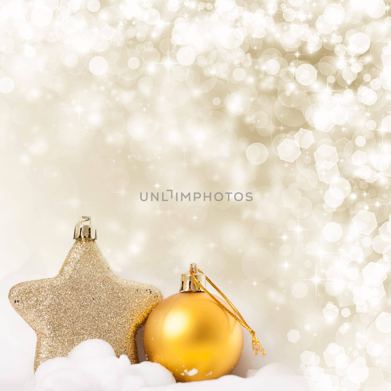 Golden Christmas background with christmas ball and star