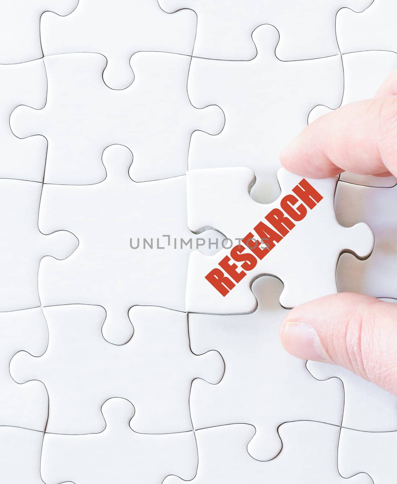 Missing jigsaw puzzle piece with word RESEARCH. Business concept image for completing the puzzle.