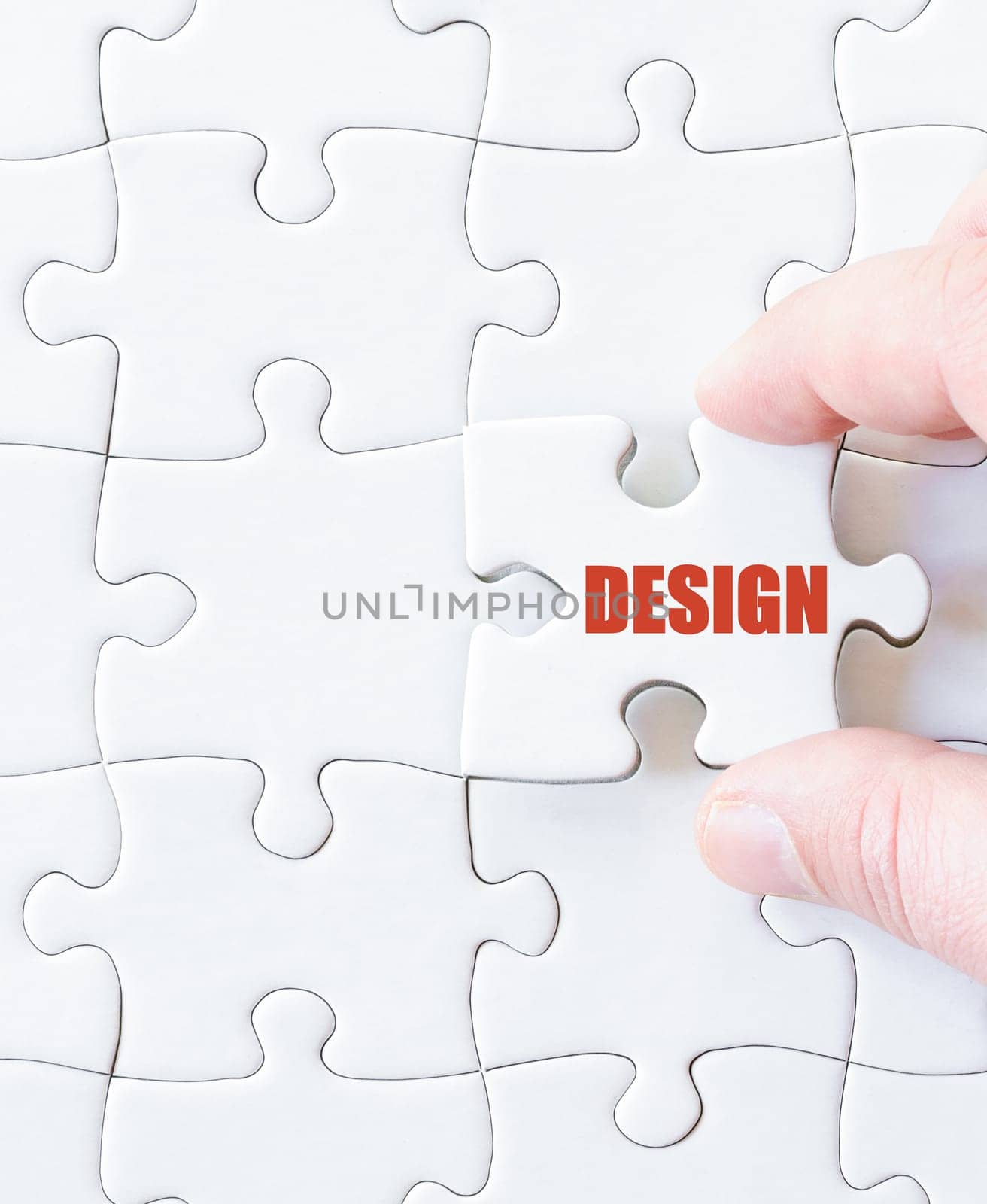 Missing jigsaw puzzle piece with word DESIGN. Business concept image for completing the puzzle.