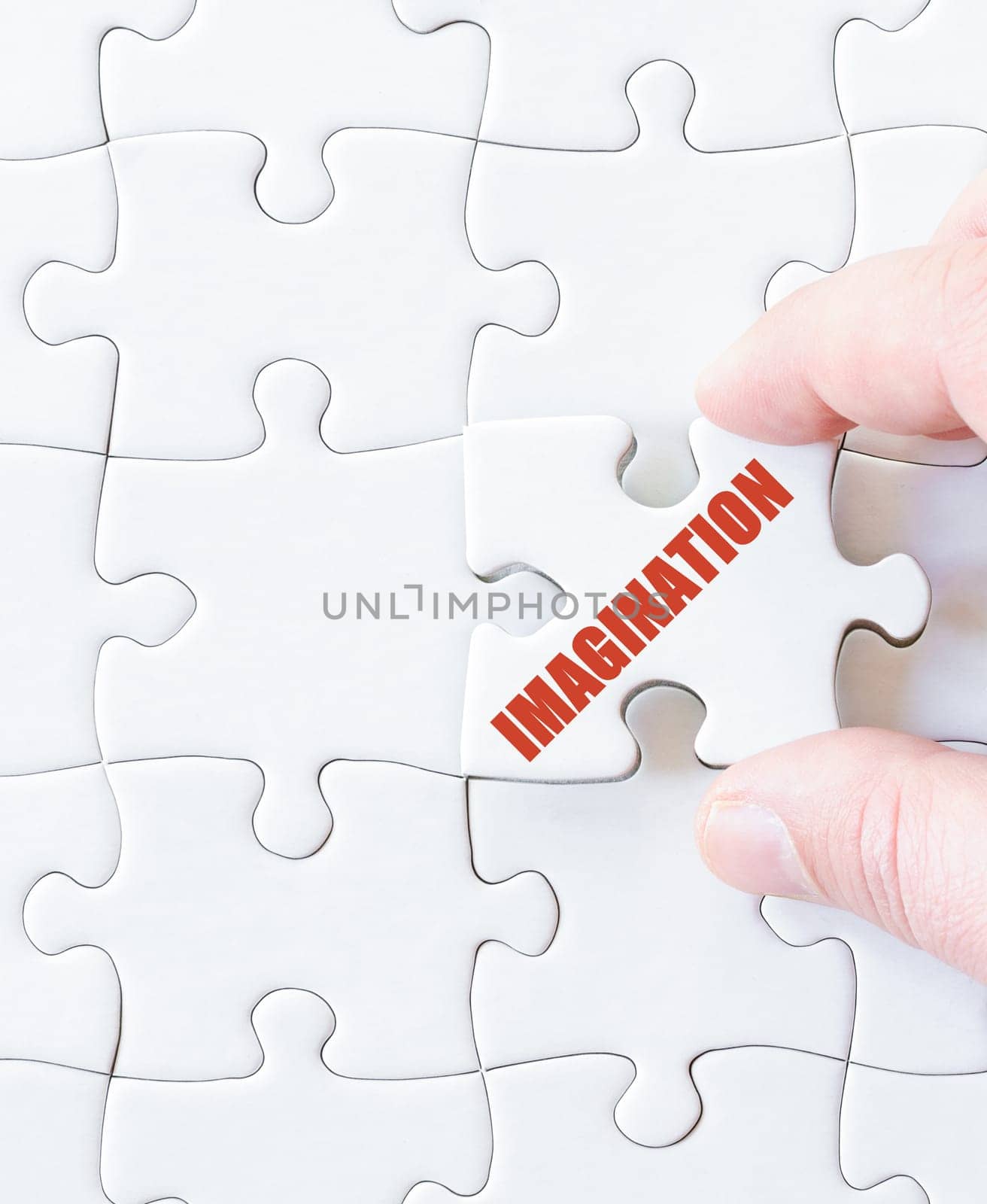 Missing jigsaw puzzle piece with word IMAGINATION. Business concept image for completing the puzzle.