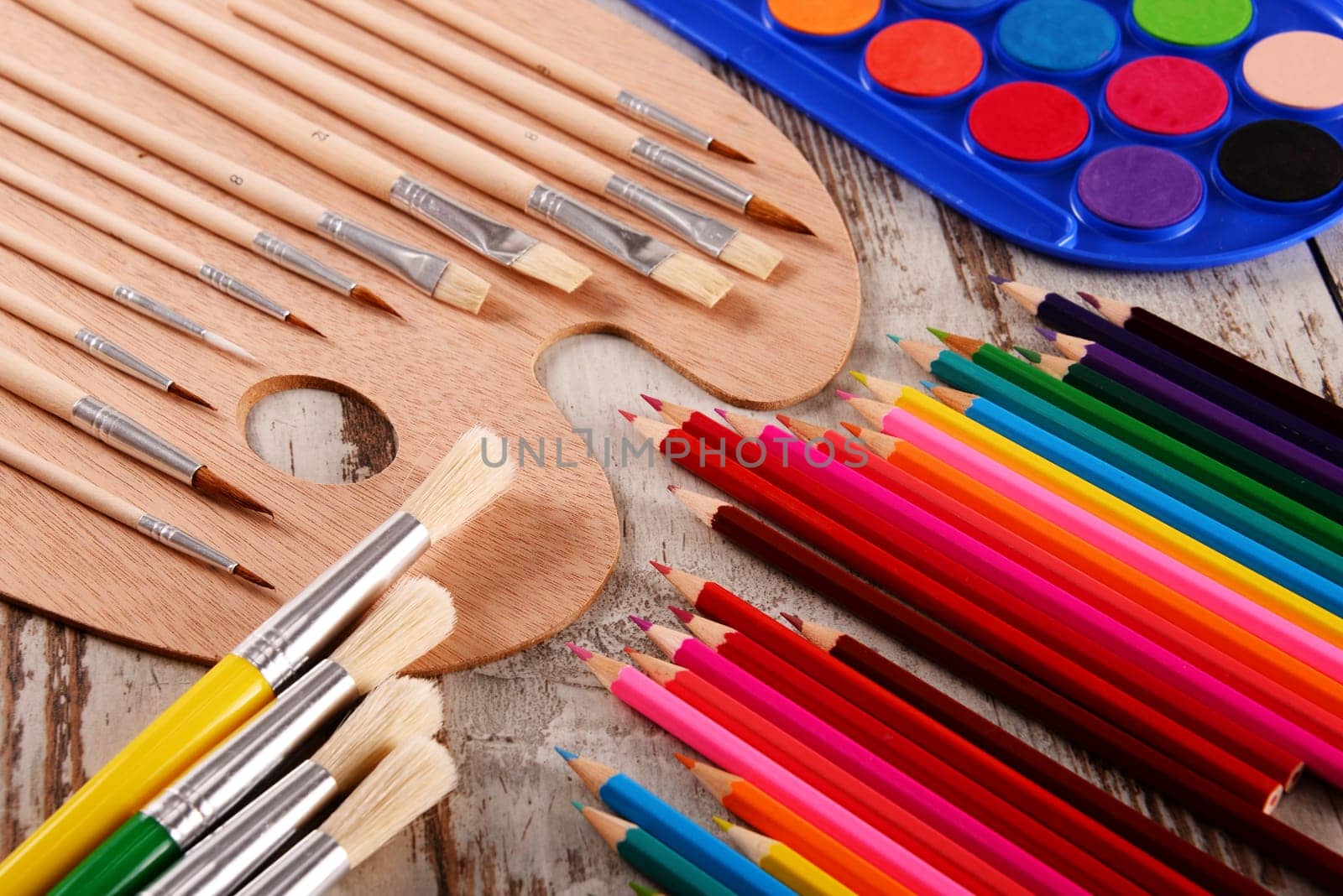 Composition with school accessories for painting and drawing.
