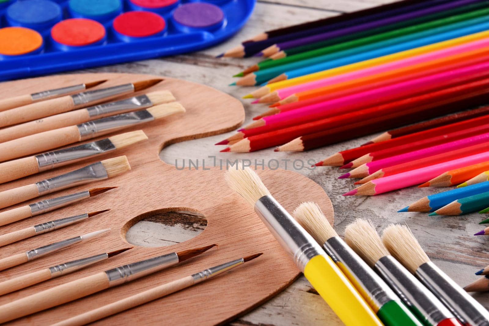 Composition with school accessories for painting and drawing.