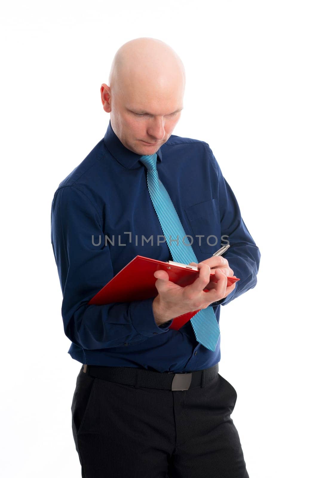 young businessman with clipboard in front of white background