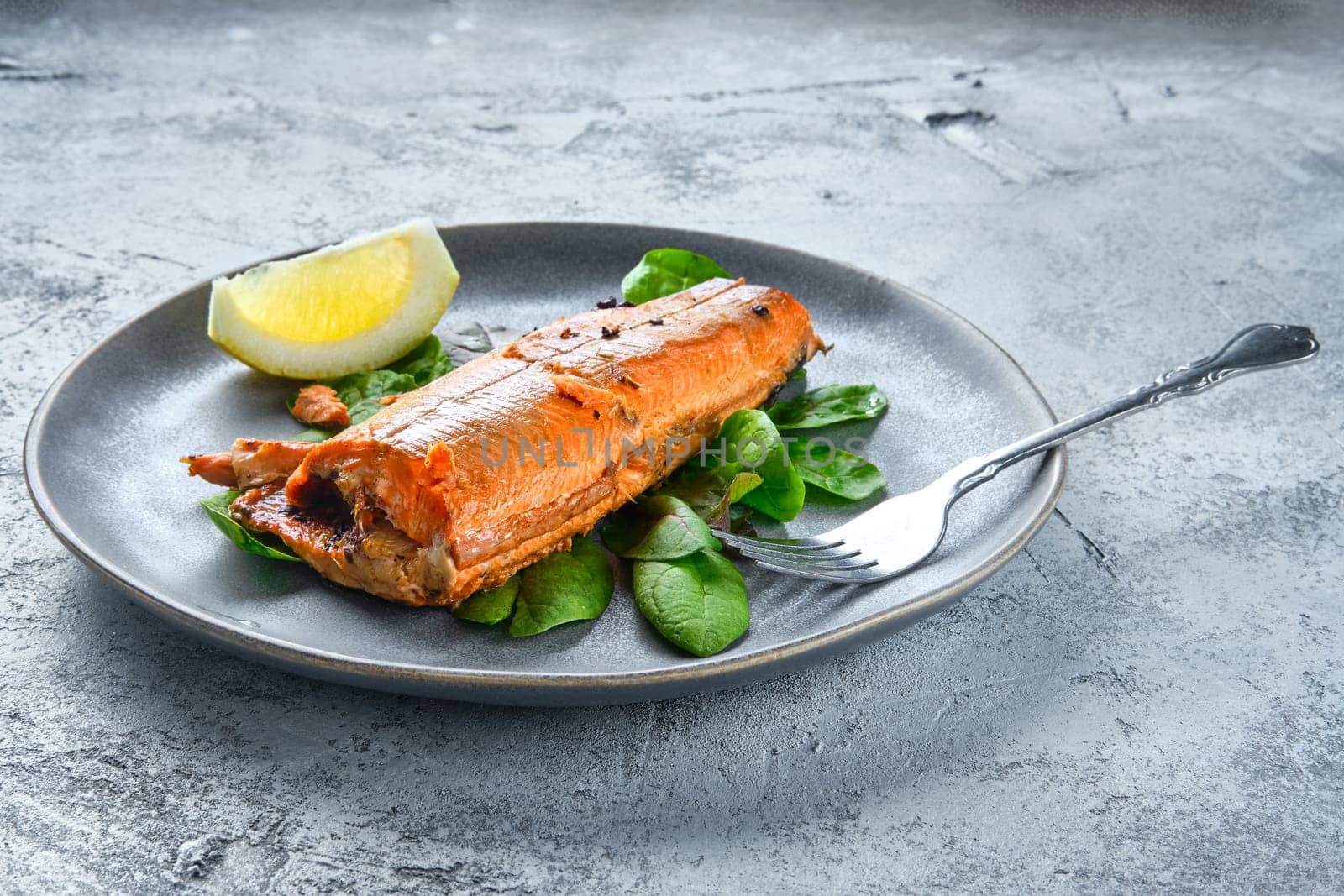 Red salmon baked in oven with spice