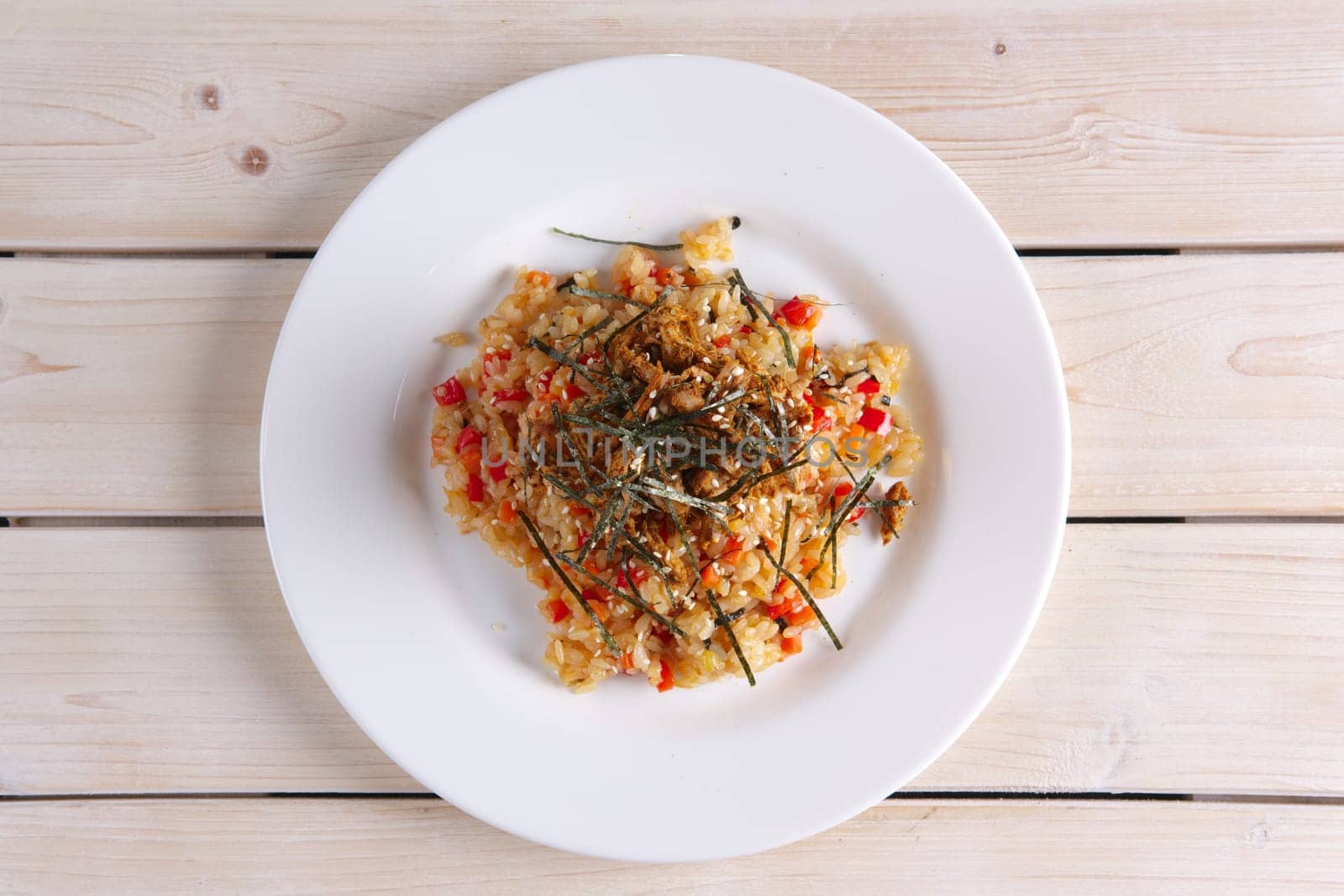 Top view of pilaf with meat and bell pepper