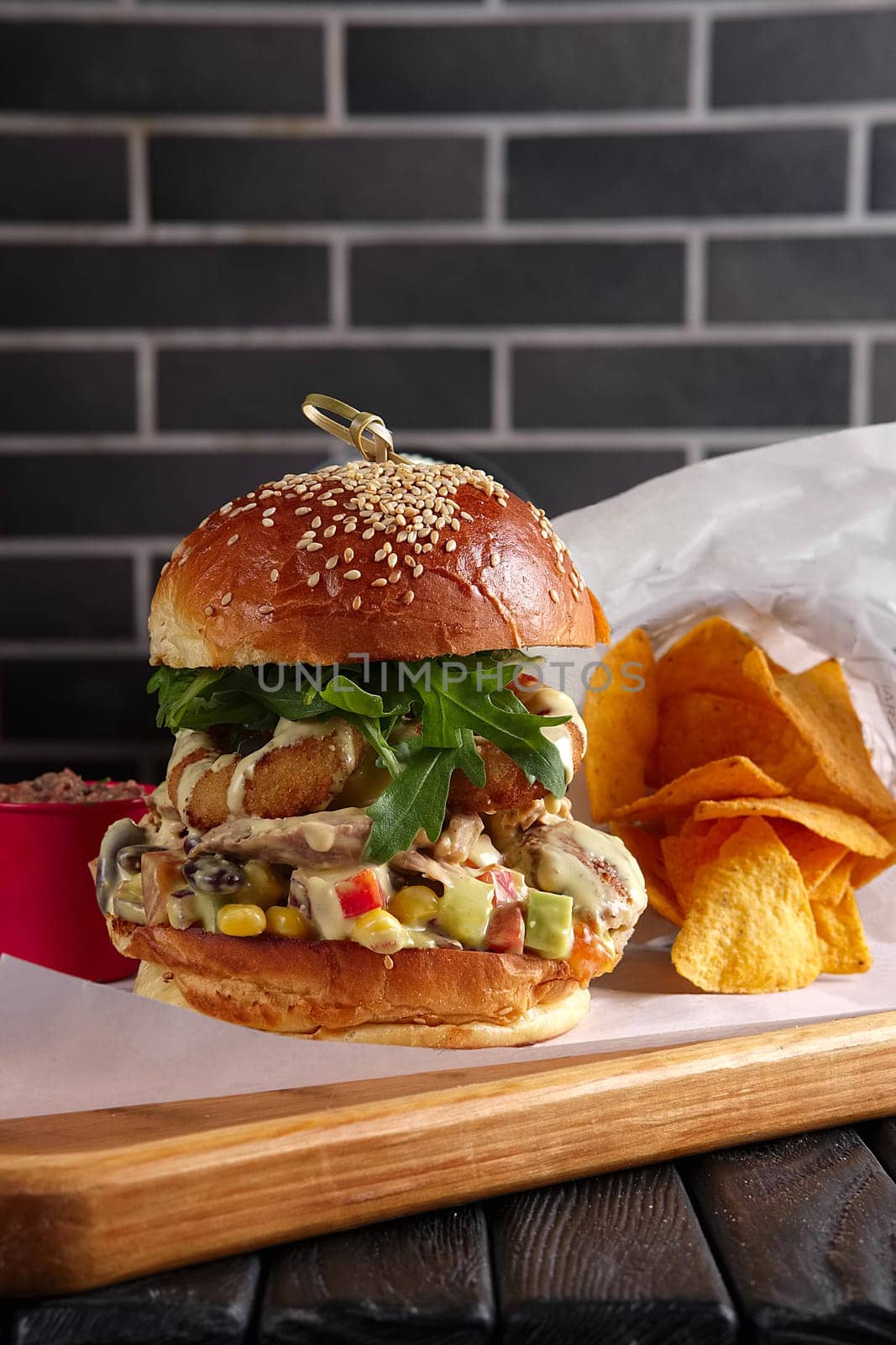 Bacon burger on wooden plate