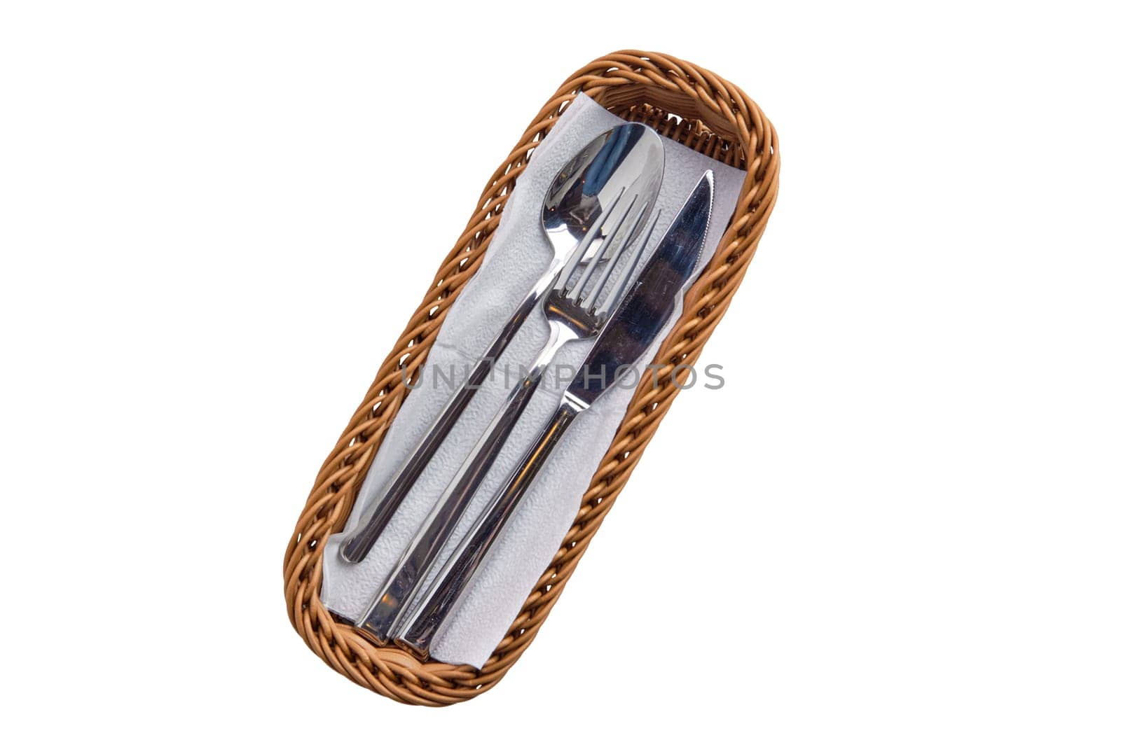 Set of cutlery in basket isolated on white background
