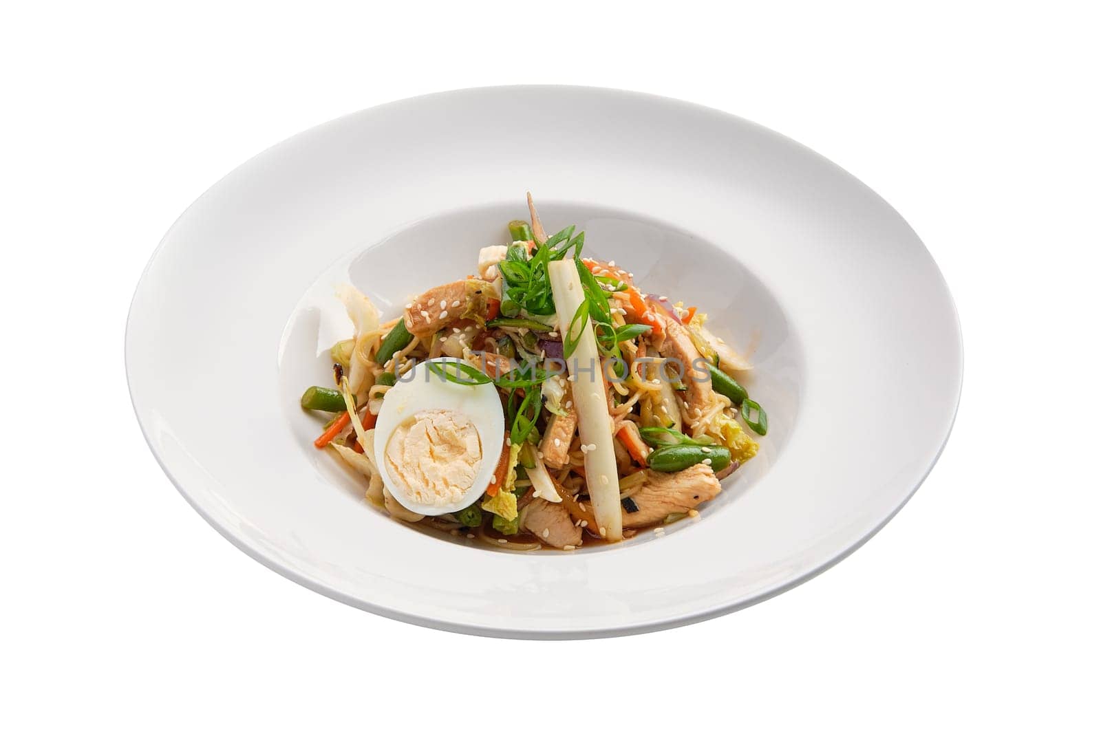 Wok with chicken, egg and green beans isolated on white background