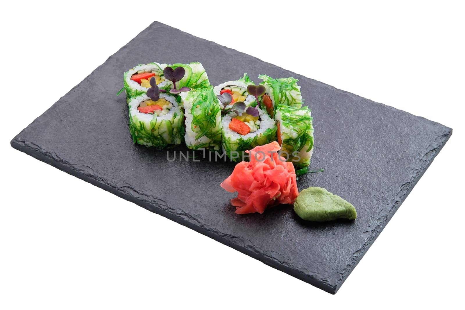 Set of rolls with seaweed chuka salad isolated on white background