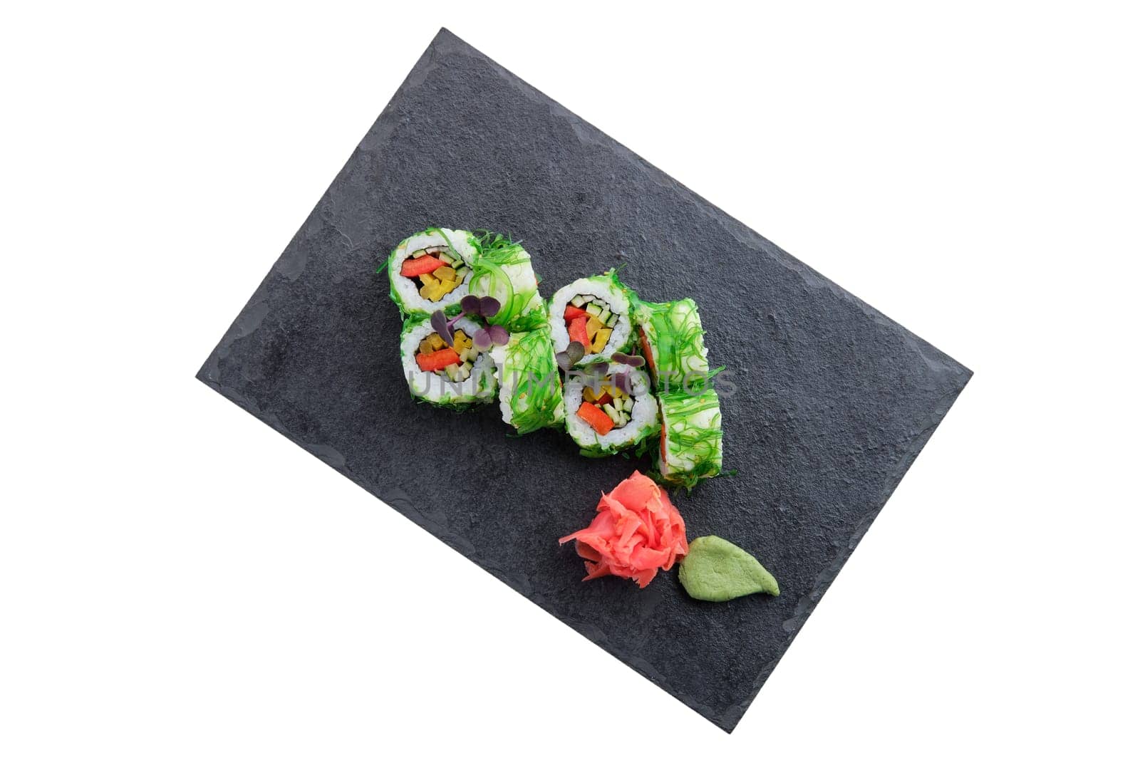 Set of rolls with seaweed chuka salad isolated on white background