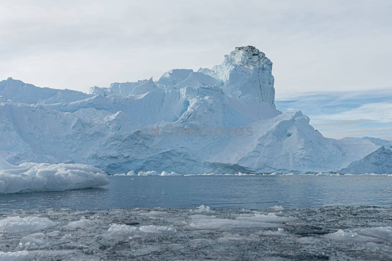 Antarctic iceberg landscape in Cierva Cove - a deep inlet on the west side of the Antarctic Peninsula, surrounded by rugged mountains and dramatic glacier fronts.