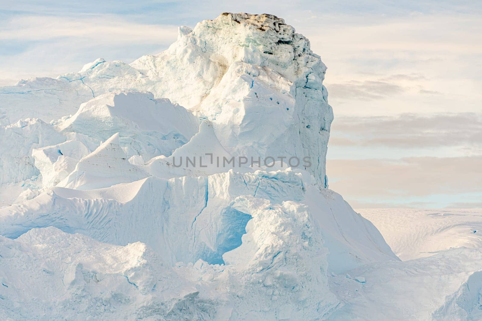 Antarctic iceberg landscape in Cierva Cove - a deep inlet on the west side of the Antarctic Peninsula, surrounded by rugged mountains and dramatic glacier fronts.