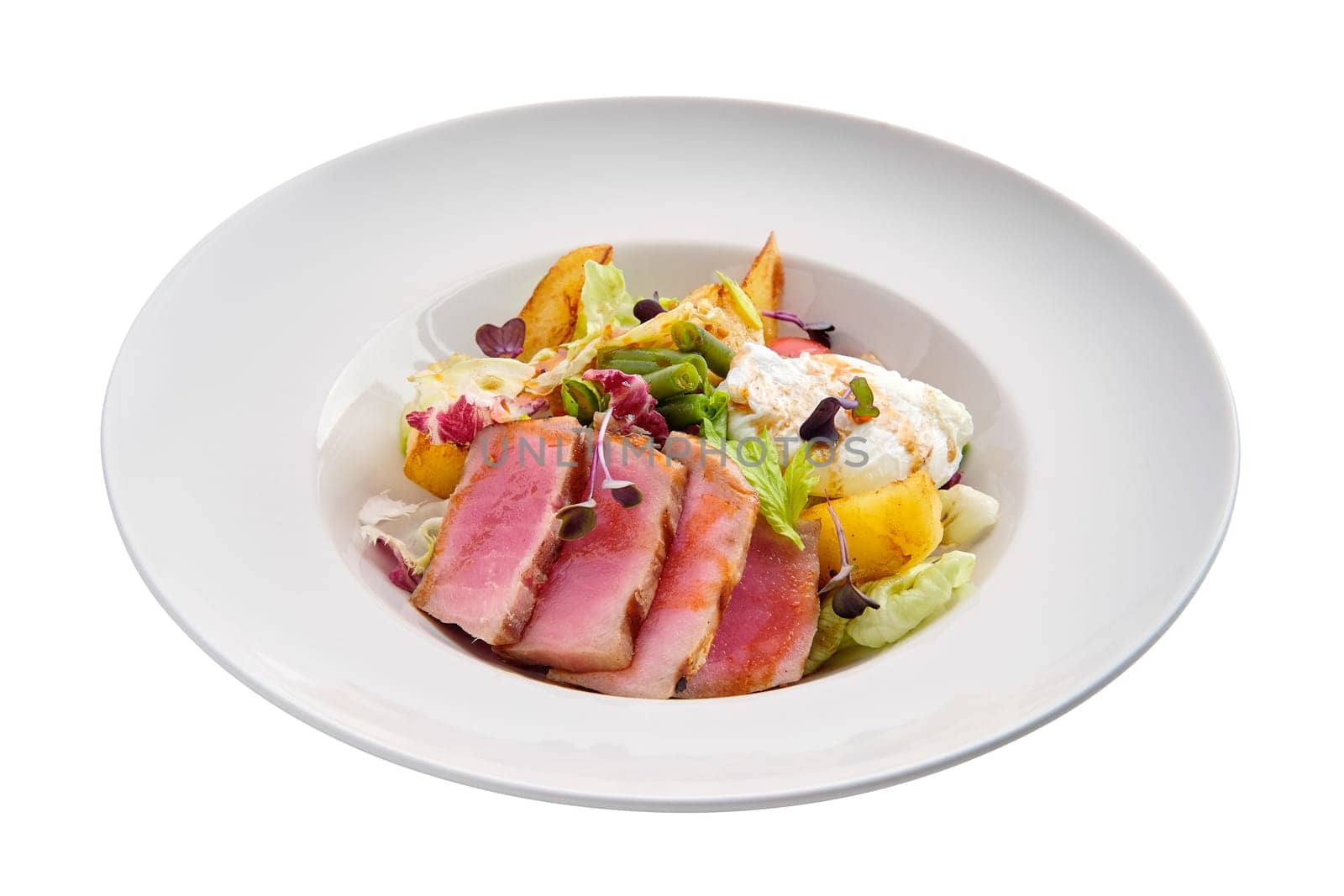 Grilled tuna with potato, cabbage, green beans and poached egg isolated on white background