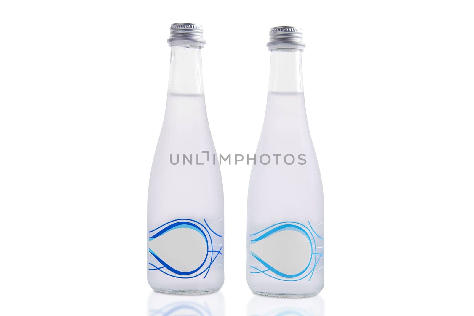 Two bottles of mineral water isolated on white background