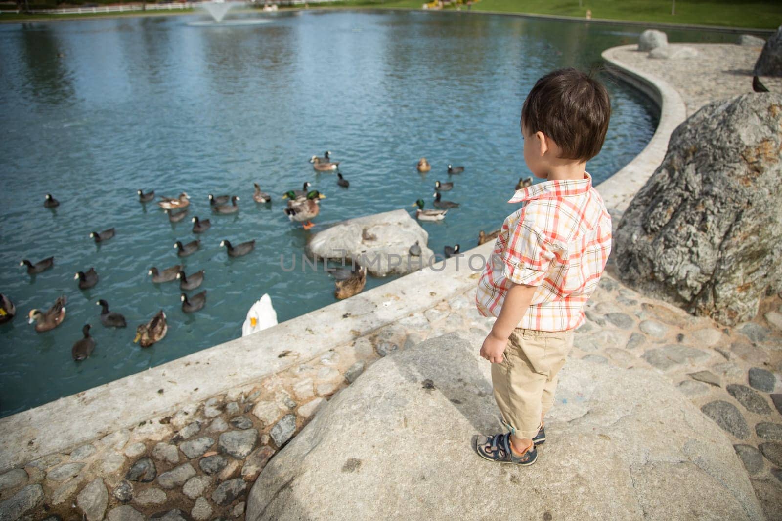 Young Chinese and Caucasian Boy Having Fun at the Park.