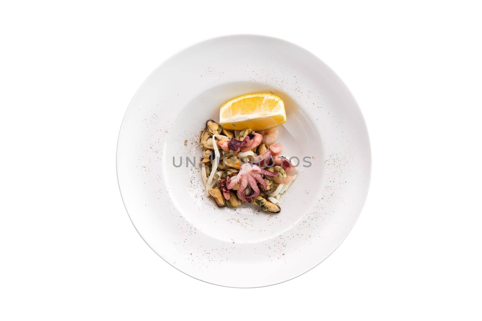 Salad with octopus, shrimps and mussels isoalted on white background