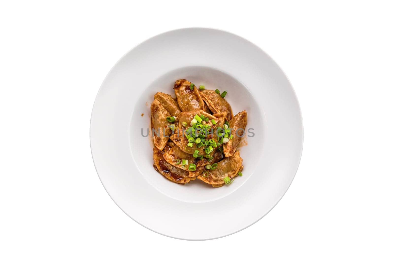 Deep-fried japanese gyoza or dumplings snack with soy sauce isolated on white background