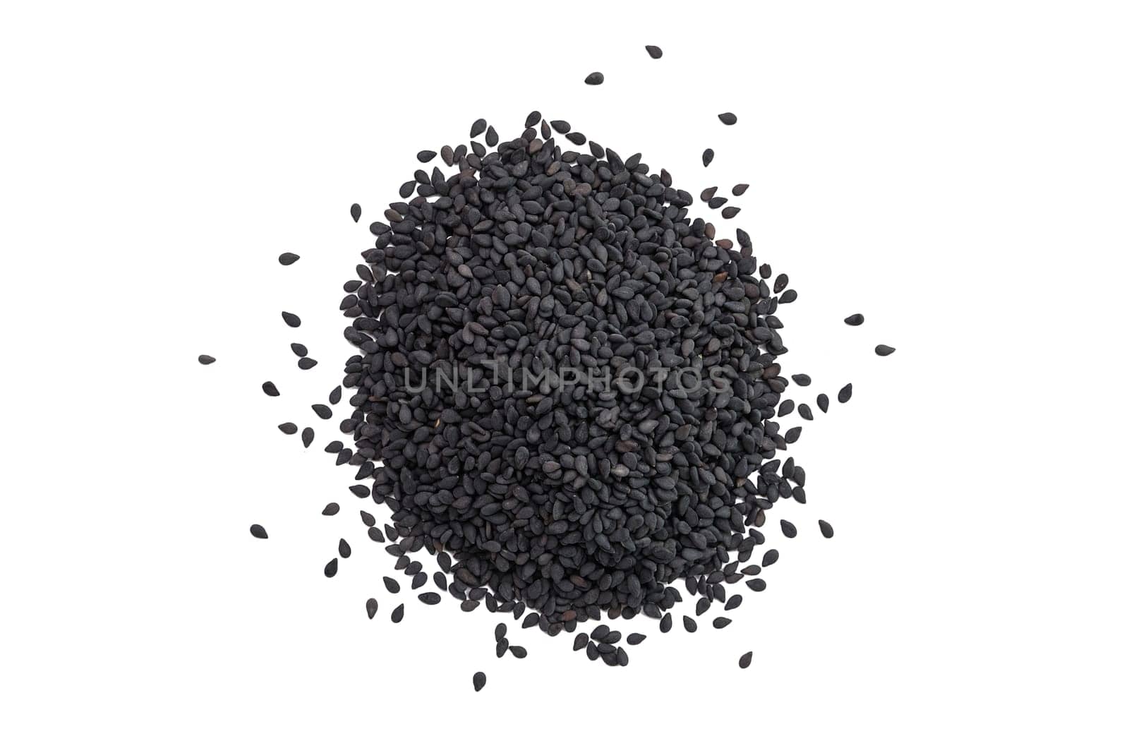 Top view of scattered black sesame seeds isolated on white background