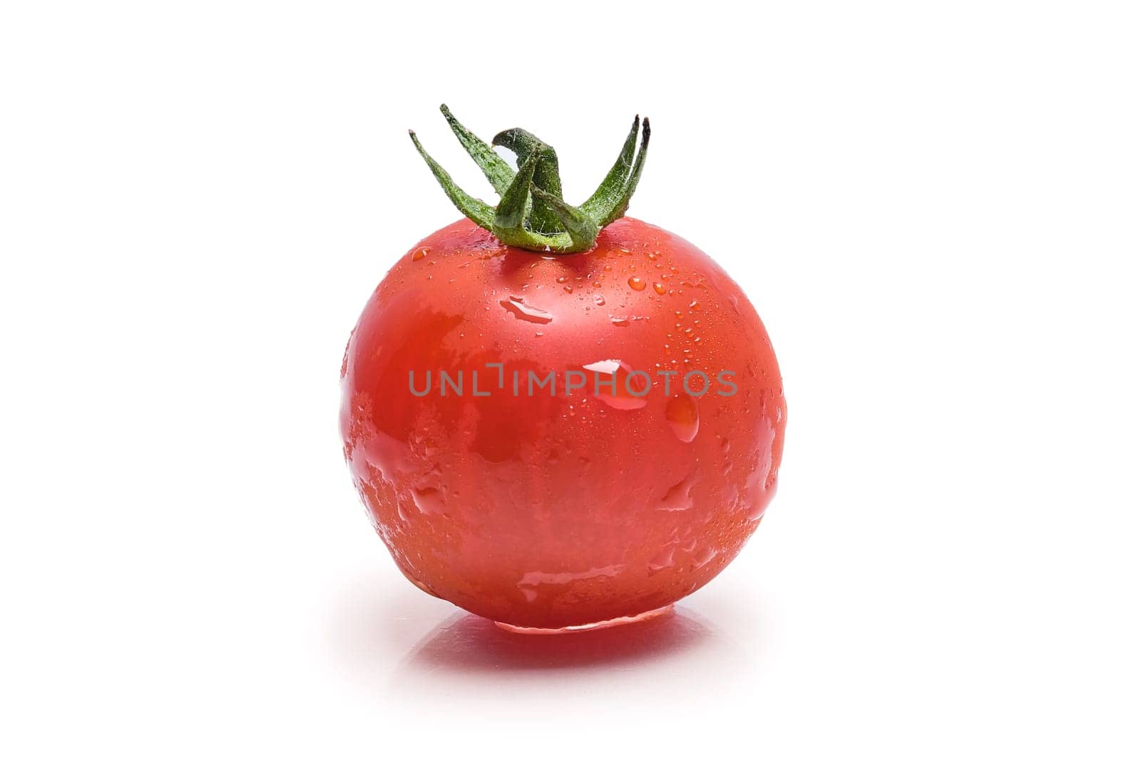 Fresh wet tomato cherry isolated on white background
