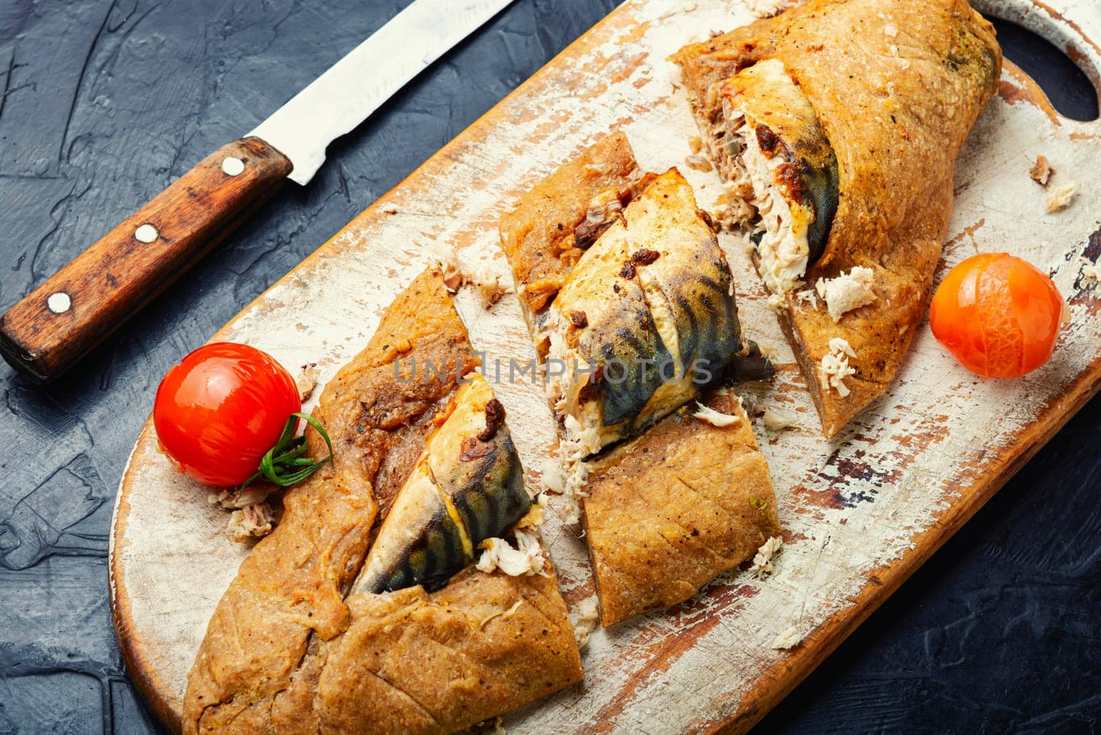 Seafood, mackerel roasted in spicy dough. Fish baked in dough