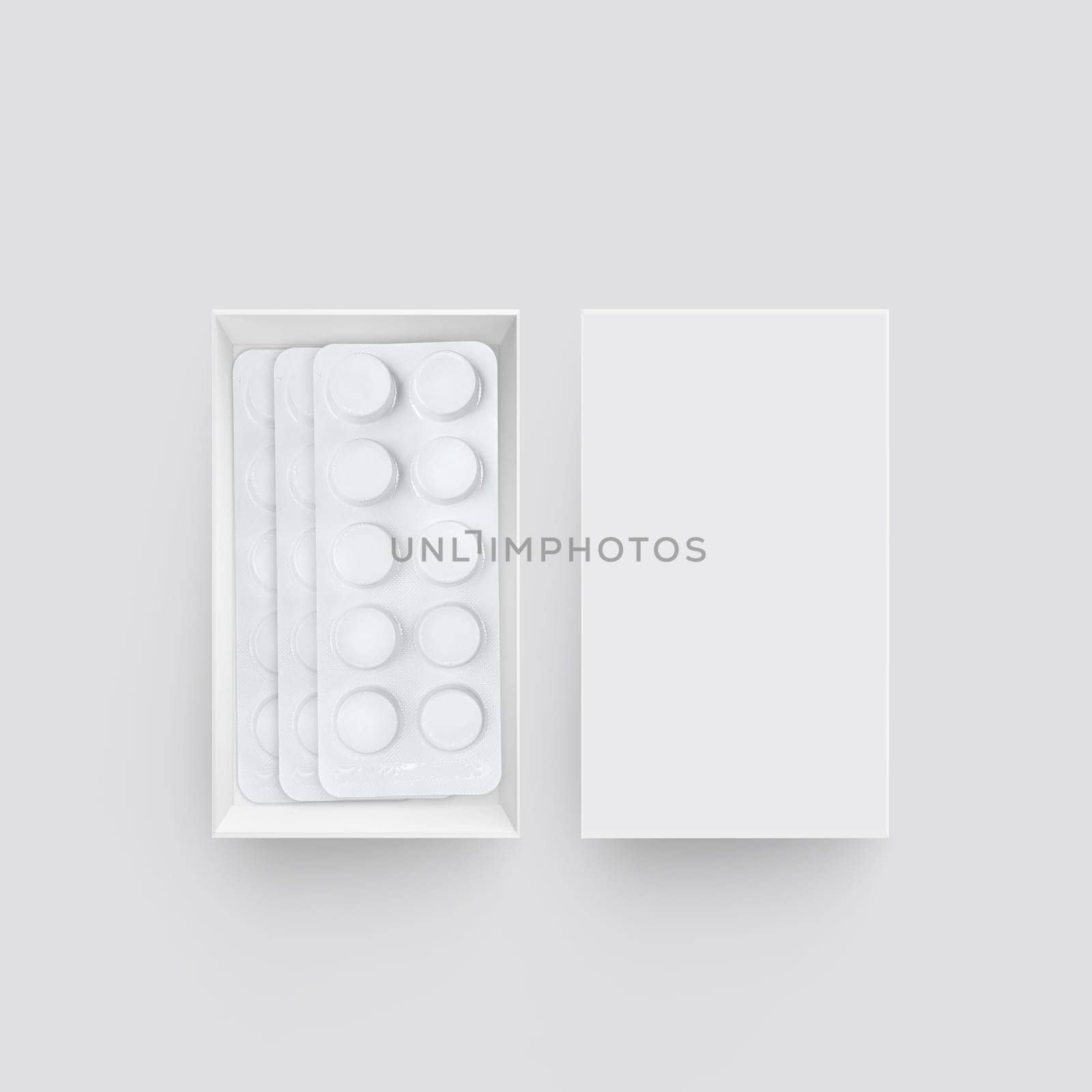 Package with medicinal pills on gray background. top view
