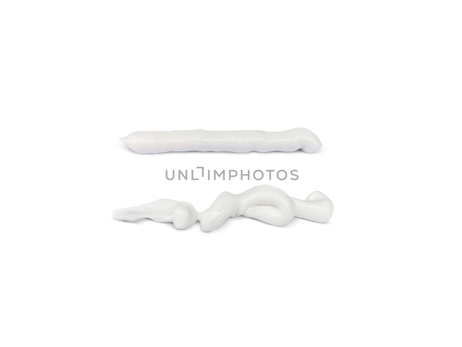 White cosmetic cream or acrylic paint is painted white on a white background