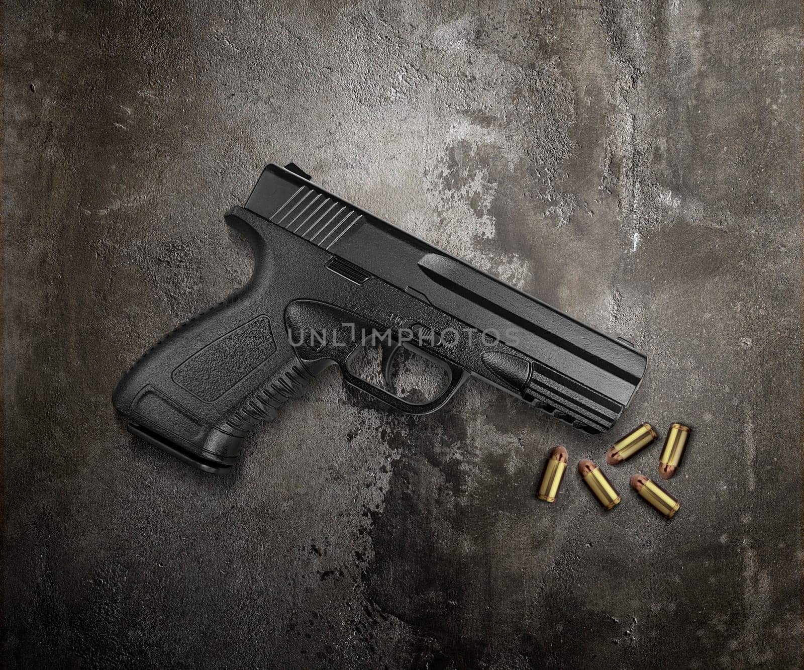 Bullets and pistols on cement floor