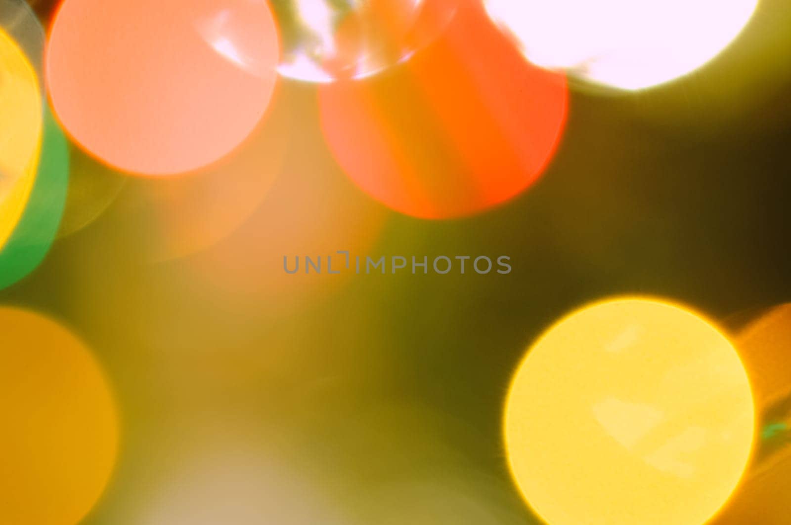 Background bokeh effect boof bright circles of red and orange color
