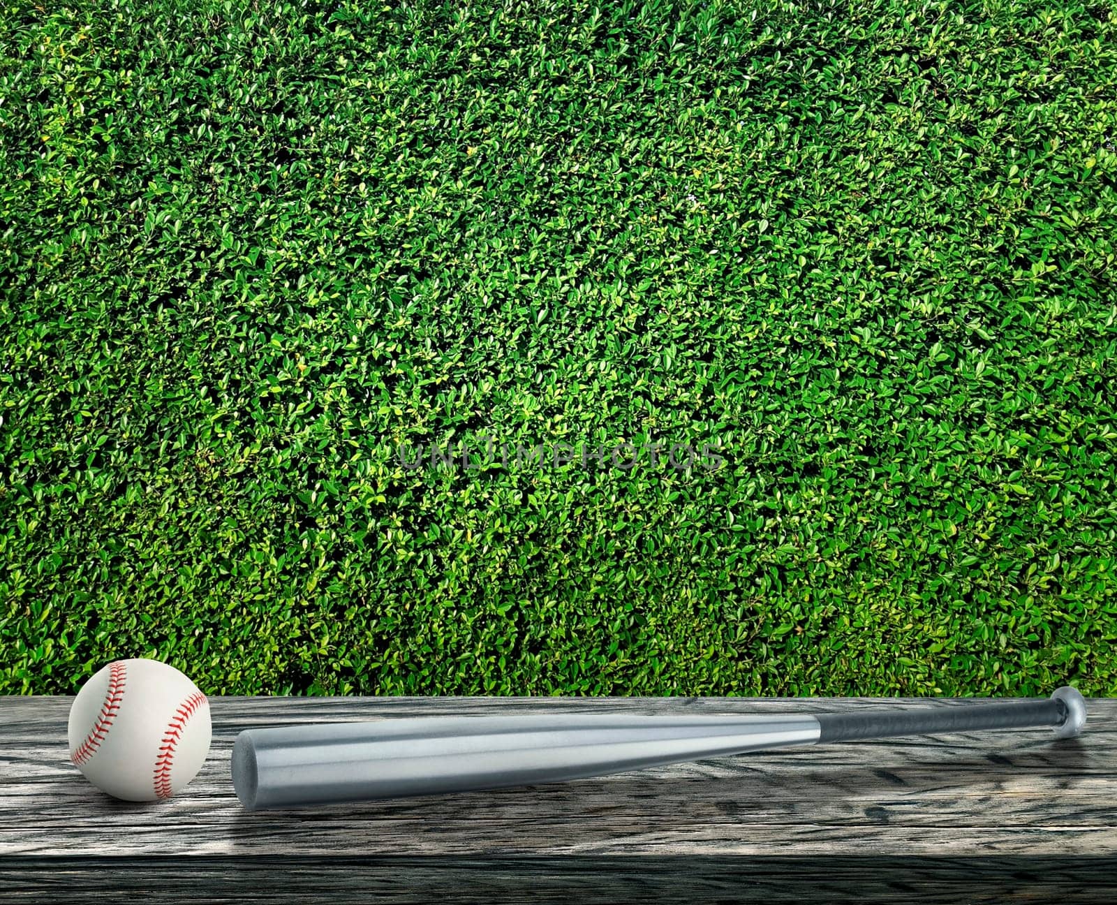Baseball bat and ball on wooden table top