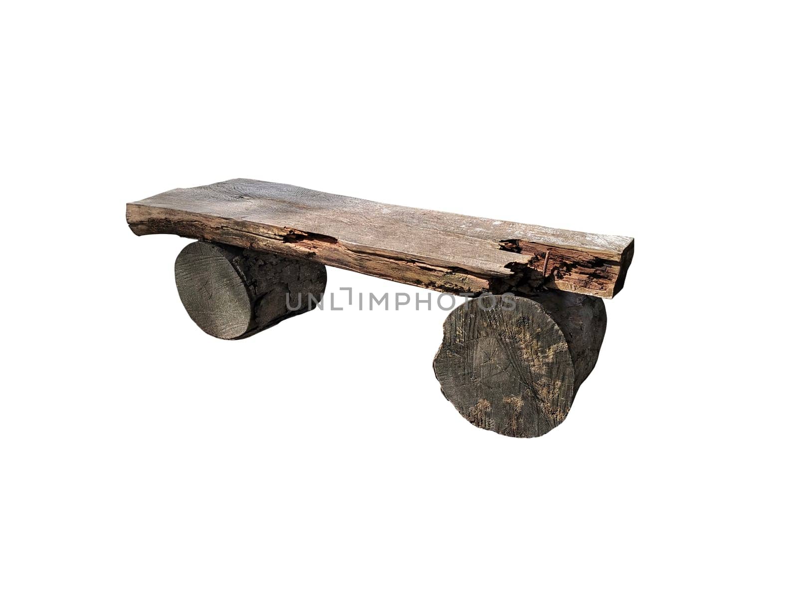 Ancient rural bench from logs. Isolated over white. Roughly hammered together wooden bench.