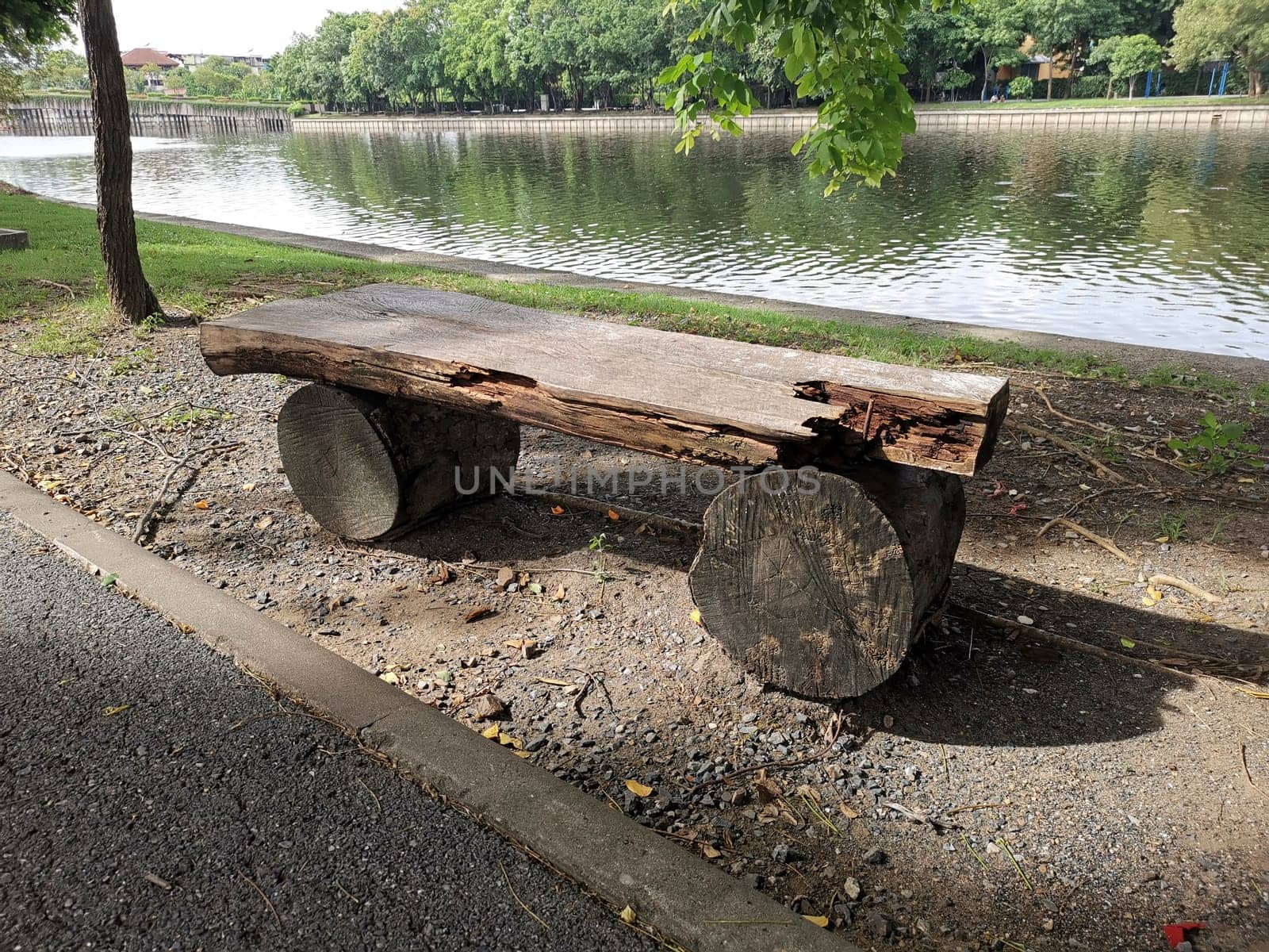 Old wooden bench or wooden chair in the park