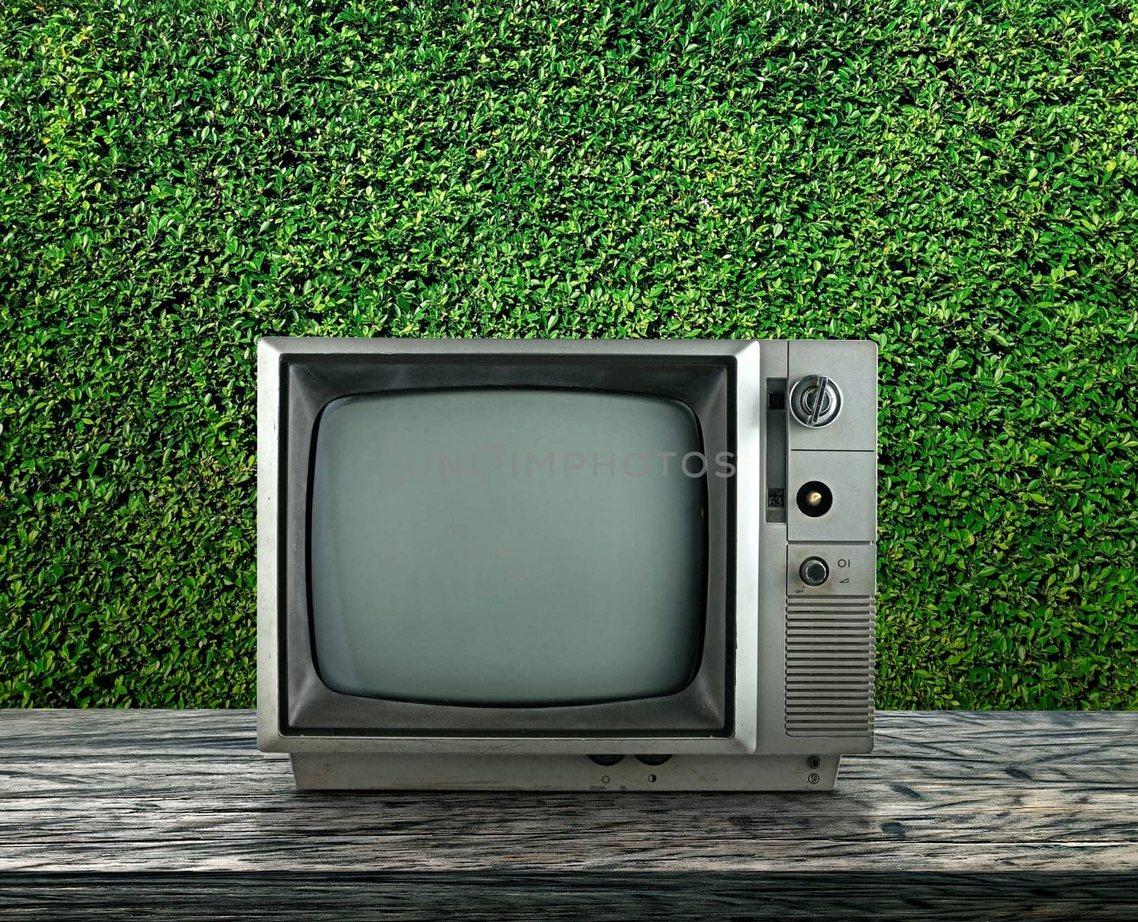 Old television vintage on wooden with black background, Retro, vintage TV style