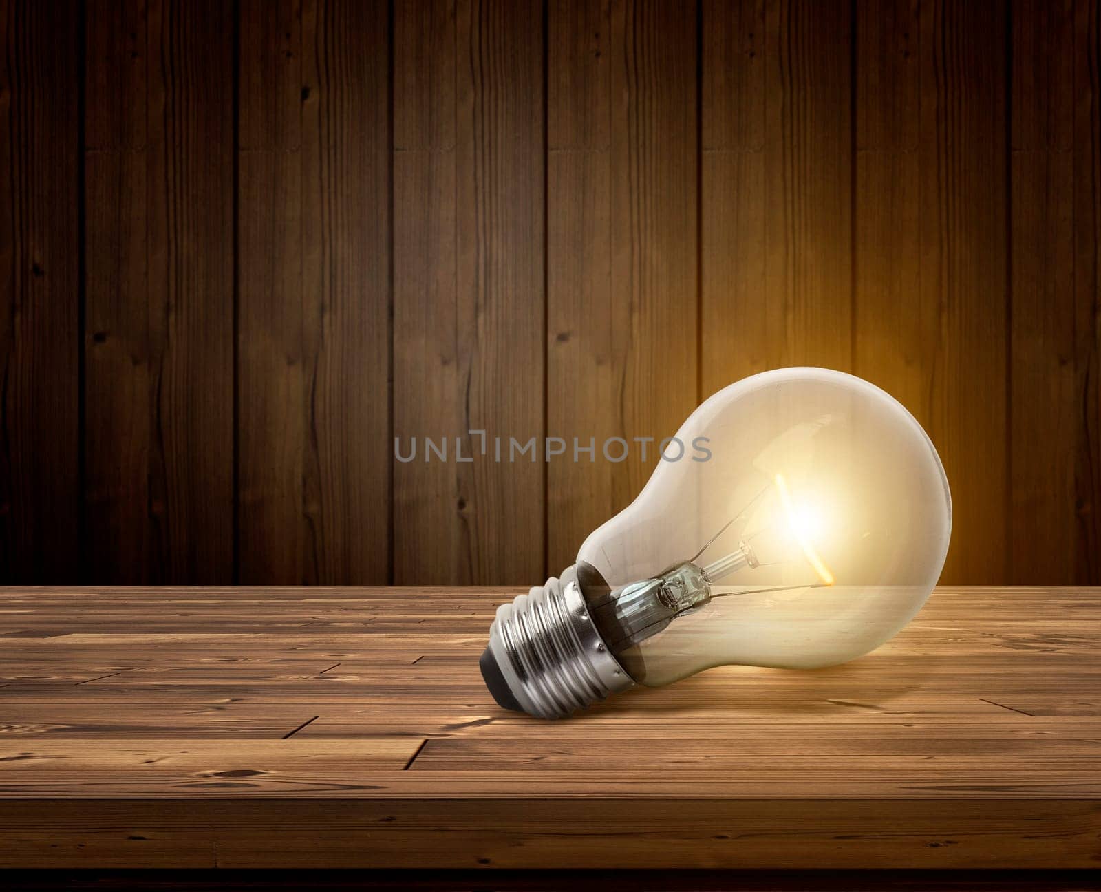 white light bulbs glowing on wooden floor