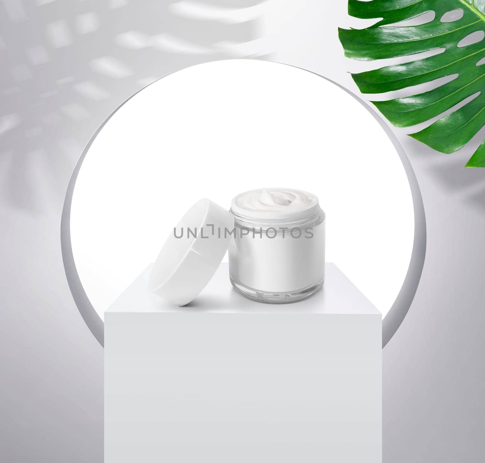 Whitening cream in a glistening white spherical base packaging. with light shining through windows and tropical plants, for cosmetic advertisements